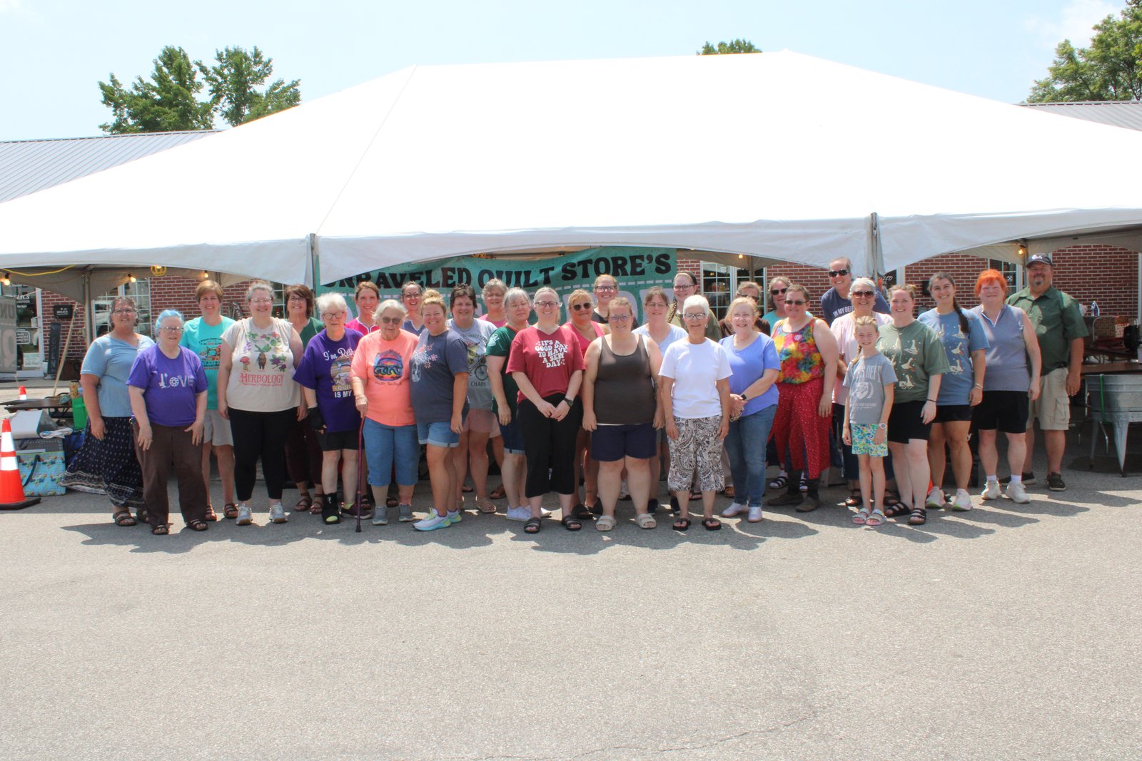 All participants in the 2026 Quilt-a-thon pose for a group photo. TYLER DEFORD