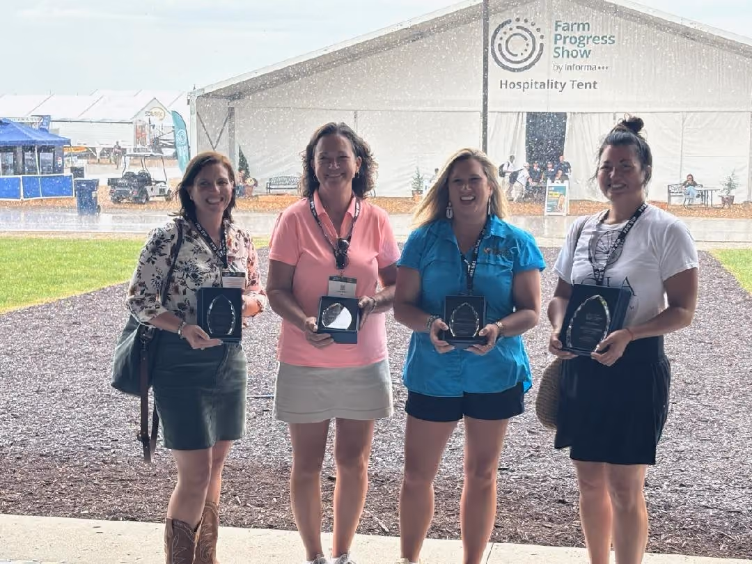 The four finalists for the Women in the Field award stand under cover with their awards. From left, Lisa Tate from California, Doris Scully, Karen Makomson from Mississippi and Wendy Johnson from Iowa. SUBMITTED PHOTO|DAVE SCULLY
