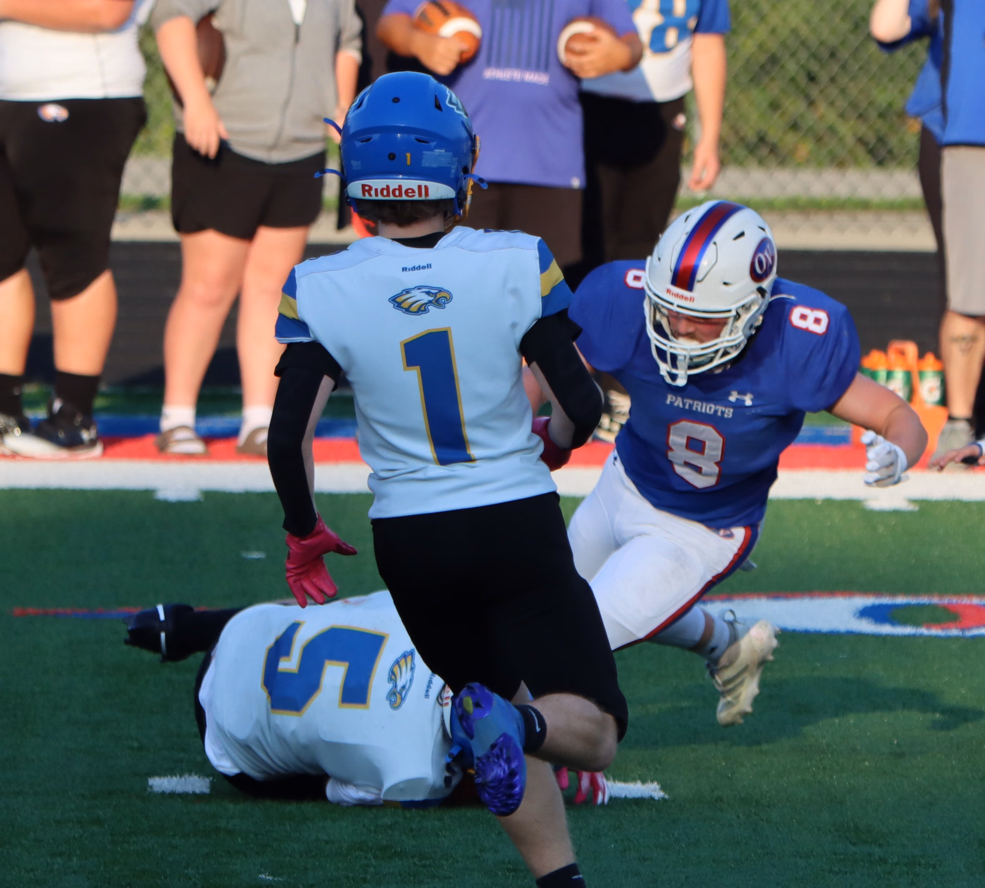 Sophomore Walker LaGrange breaks one tackle and prepares to take another hit. LaGrange had 92 rushing yards and one touchdown on the night. SUBMITTED PHOTO | AARON LAGRANGE