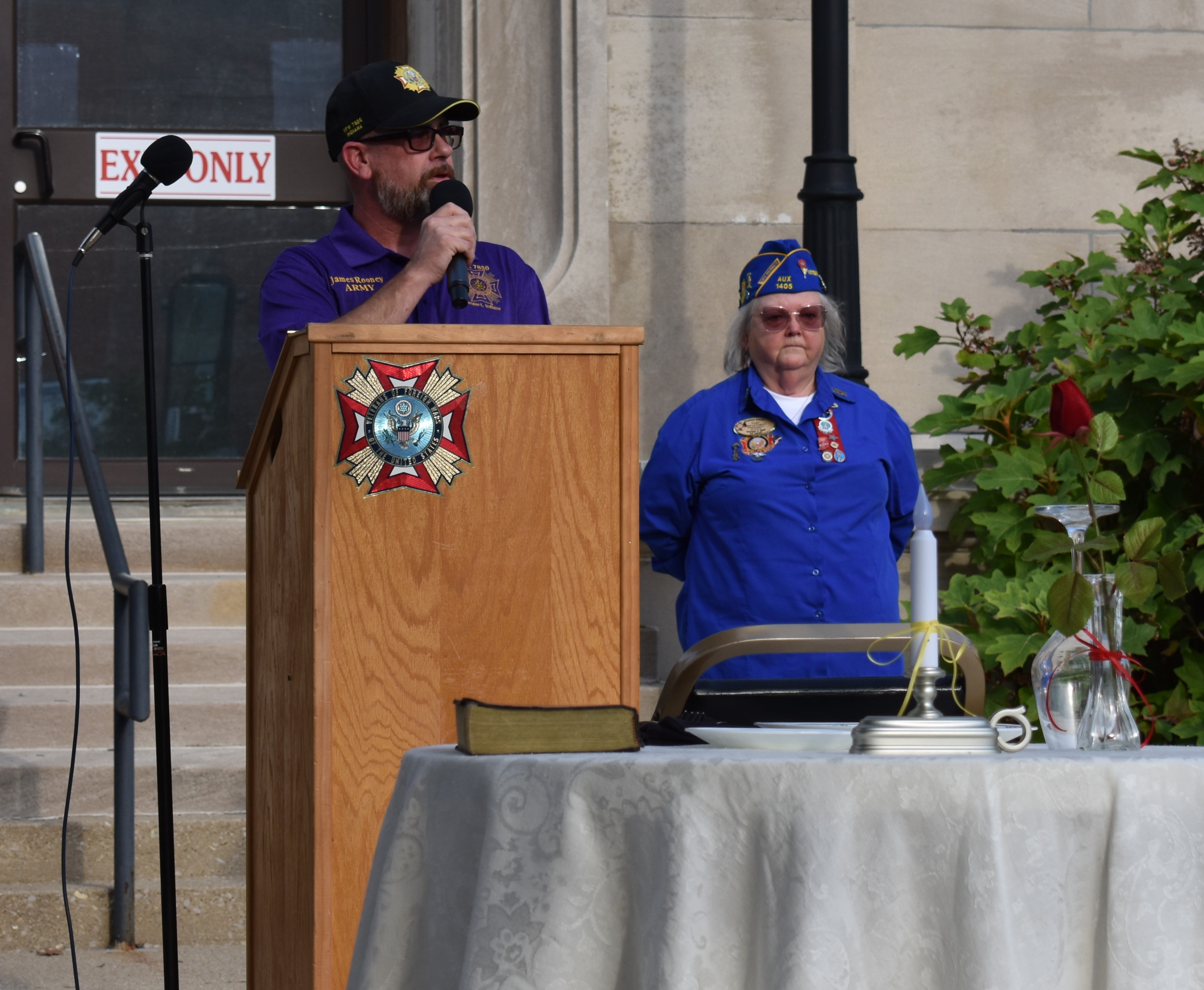 U.S. Army veteran James Rooney of Gosport VFW Post #7850 delivers the keynote 9/11 address on the Owen County Courthouse lawn, as VFW Auxiliary Post #1405 POW/MIA Chairwoman Sharron Barger looks on. TRAVIS CURRY | THE OWEN NEWS