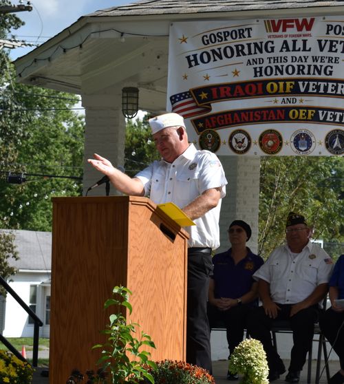 7th District Junior Vice Commander Mike Oaks speaks at the podium during the annual Patriot Day celebration hosted by VFW Post #7850 in Gosport. TRAVIS CURRY | THE OWEN NEWS