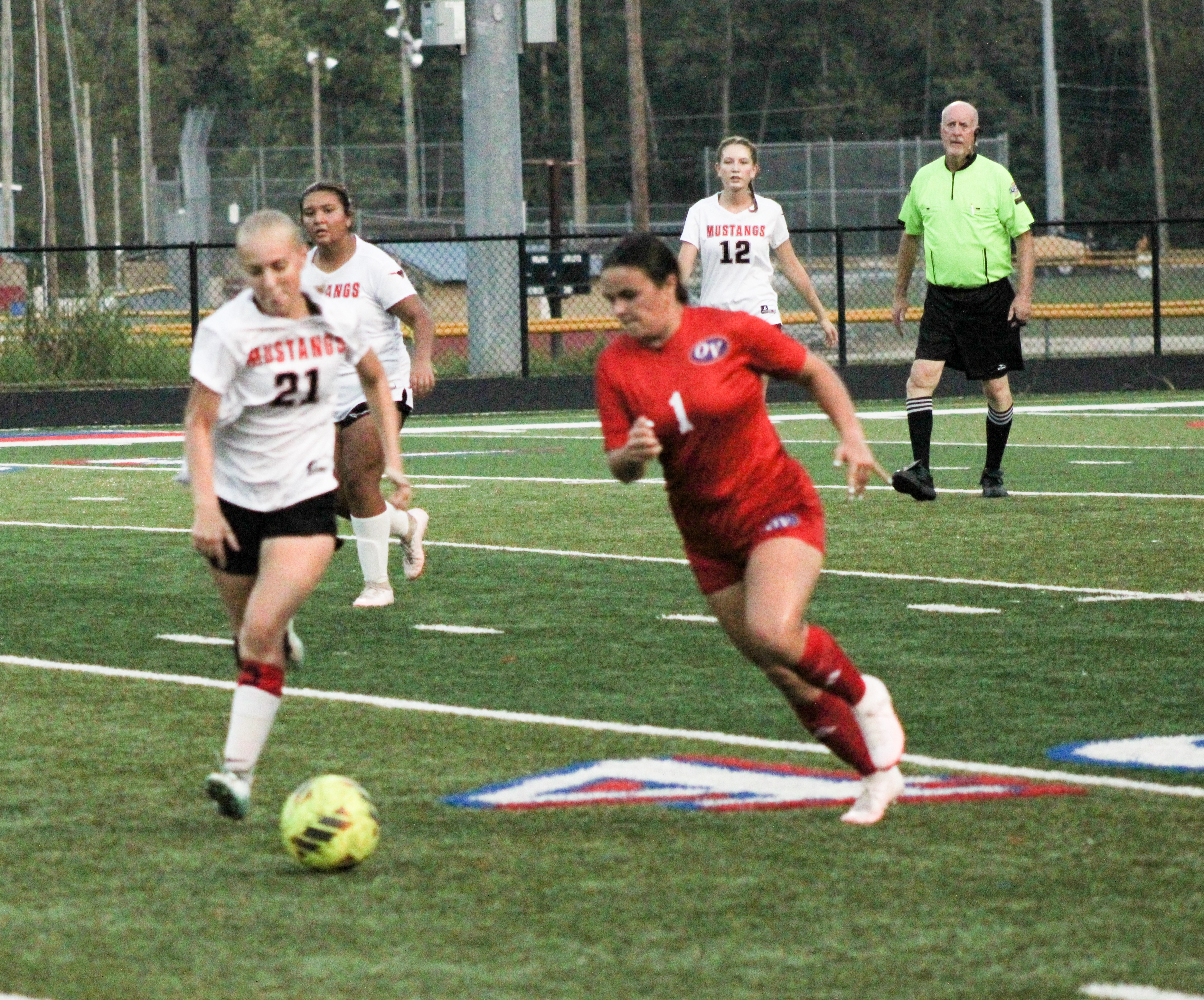 Haley Amador fights to take possession of the ball. STAFF PHOTO | THE OWEN NEWS