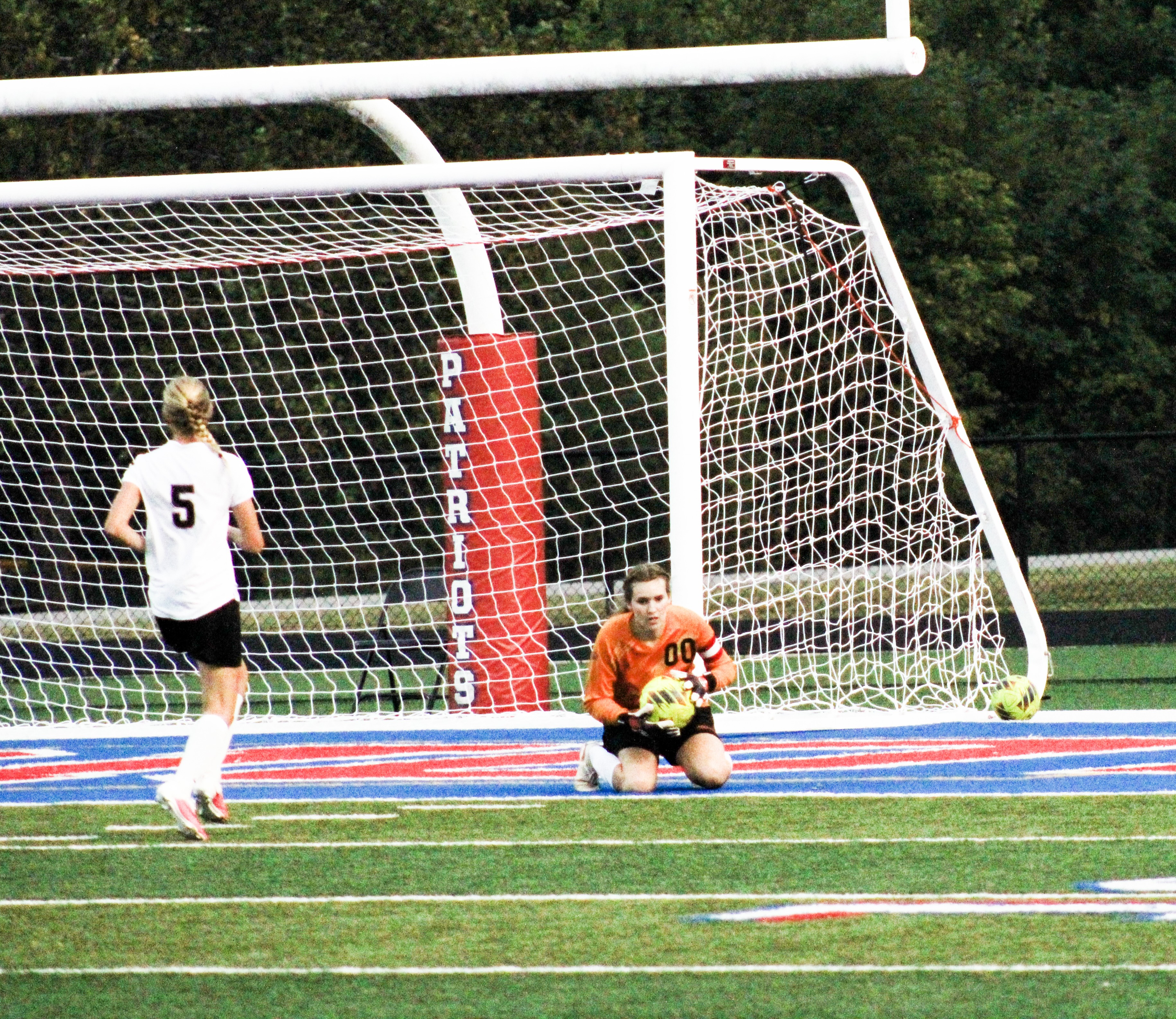 Senior goalie Jenny Brown makes a great save. STAFF PHOTO | THE OWEN NEWS