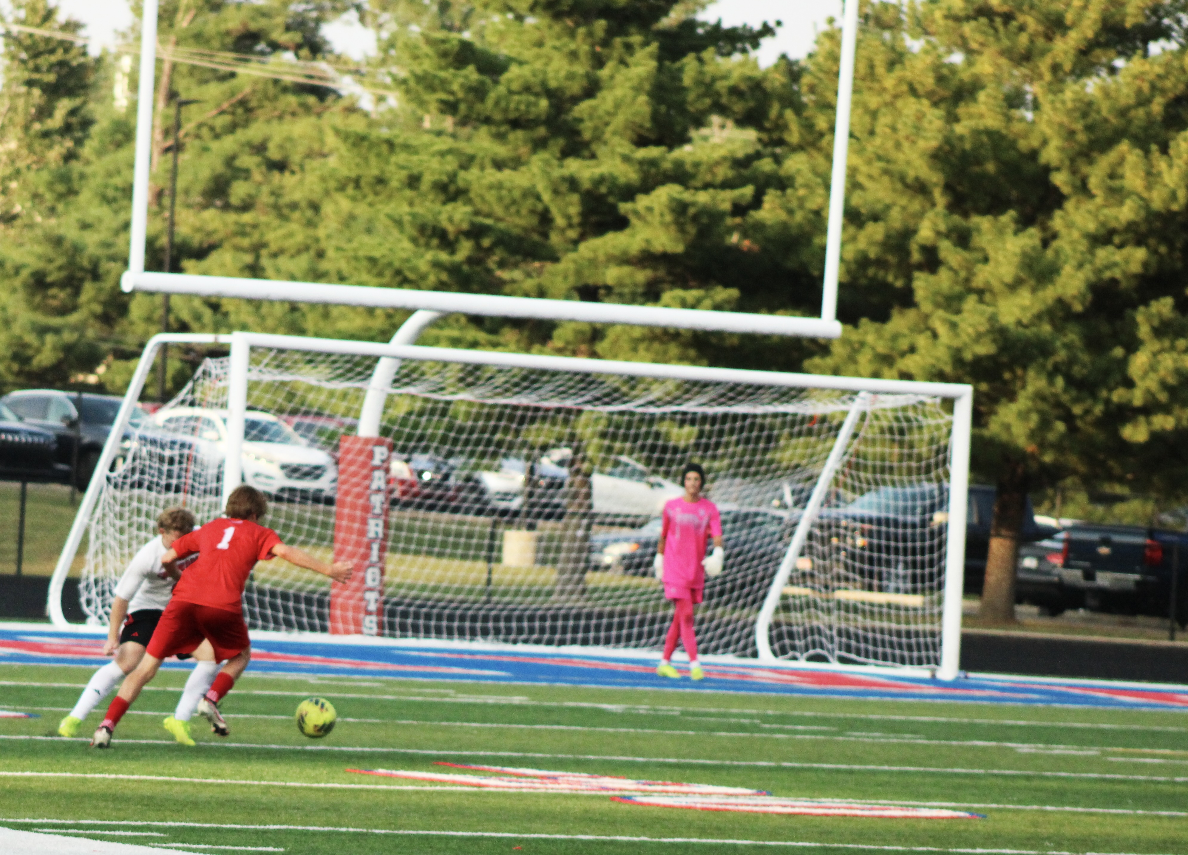 Senior Silas Wesley takes a shot…and scores! STAFF PHOTO | THE OWEN NEWS