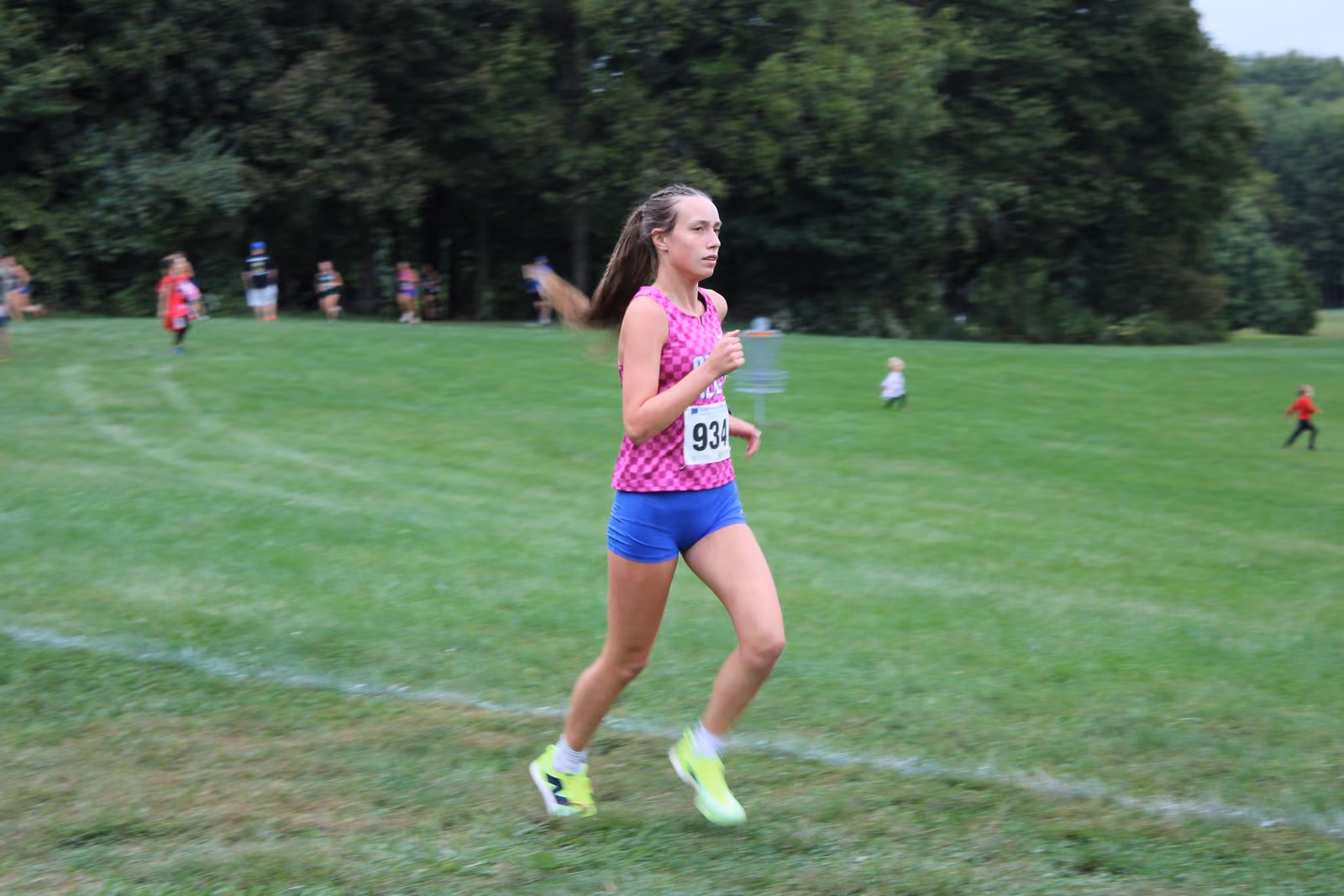 Aubrey Mangia sets her pace at roughly the midpoint of the girls’ race. She finished with a time of 23:21, good enough for 17th place. TYLER DEFORD | THE OWEN NEWS