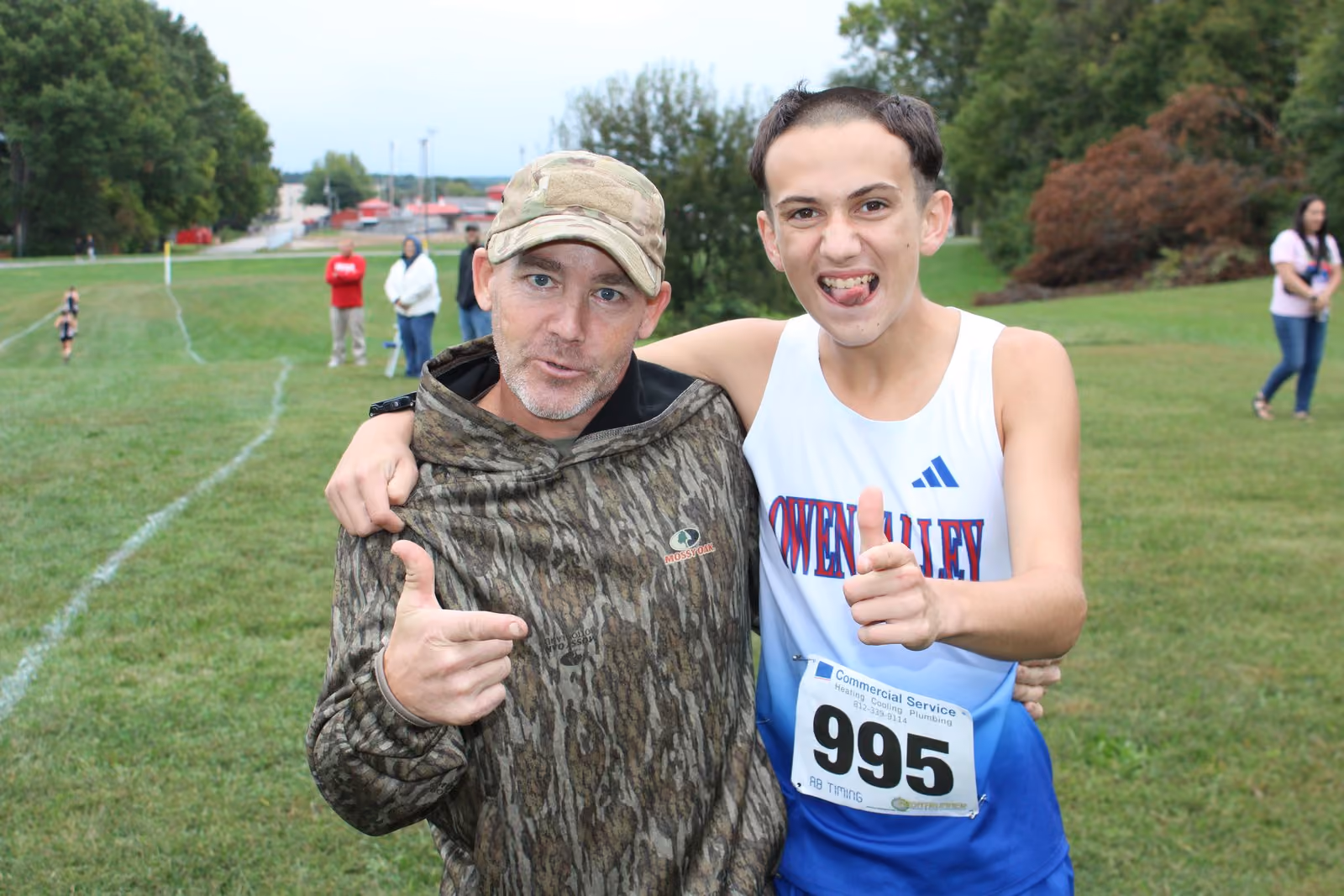 Gabriel “Juggernaut” Hasselberg poses with his father, before the boys’ race begins. TYLER DEFORD | THE OWEN NEWS