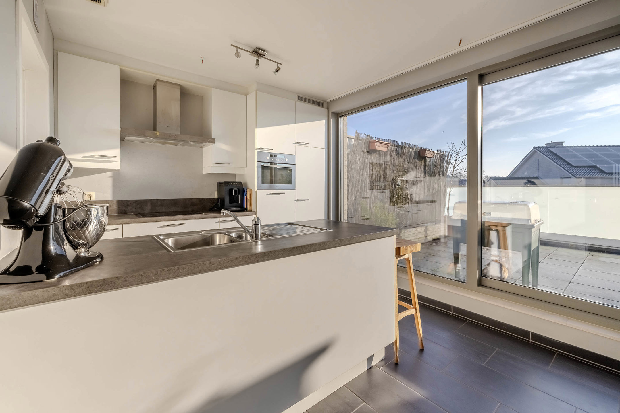 Duplex met terras en staanplaats