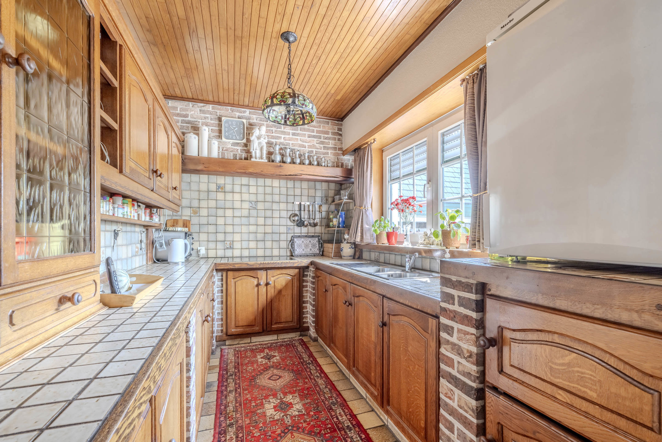 Perfect onderhouden woning met prachtige tuin op toplocatie!