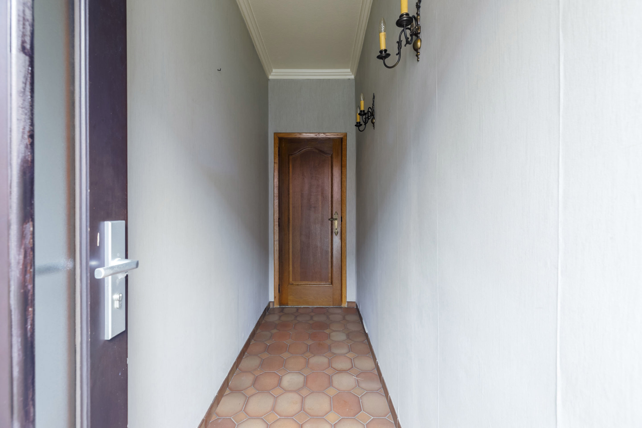Centraal gelegen te renoveren woning met potentieel