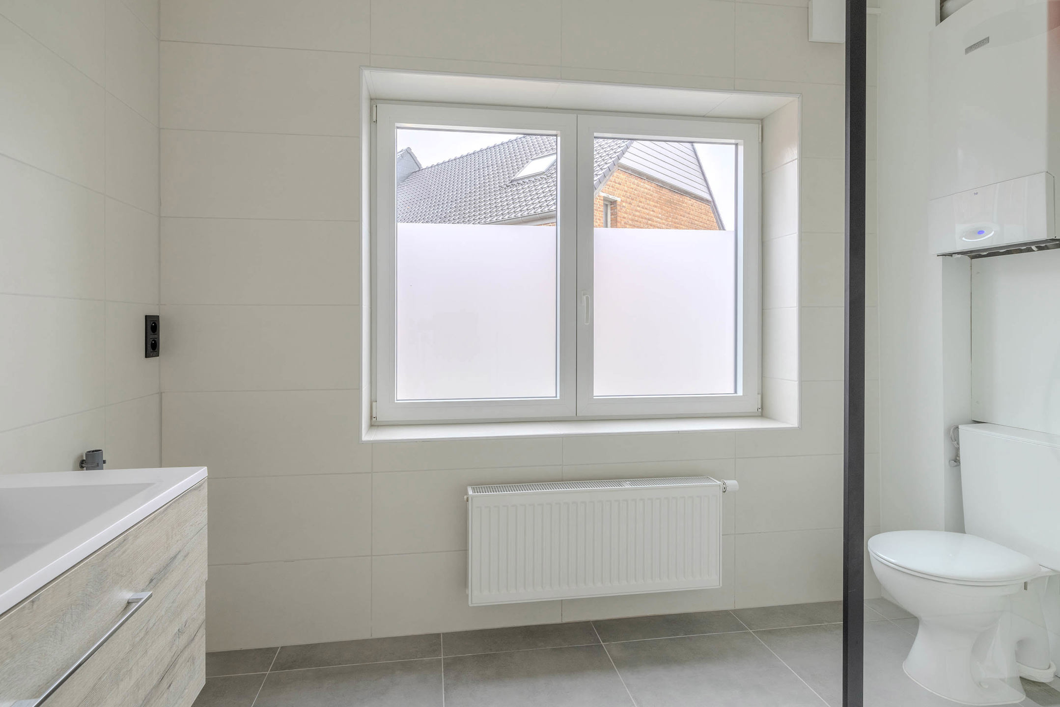 Trendy gerenoveerd appartement met 2 slaapkamers en garage