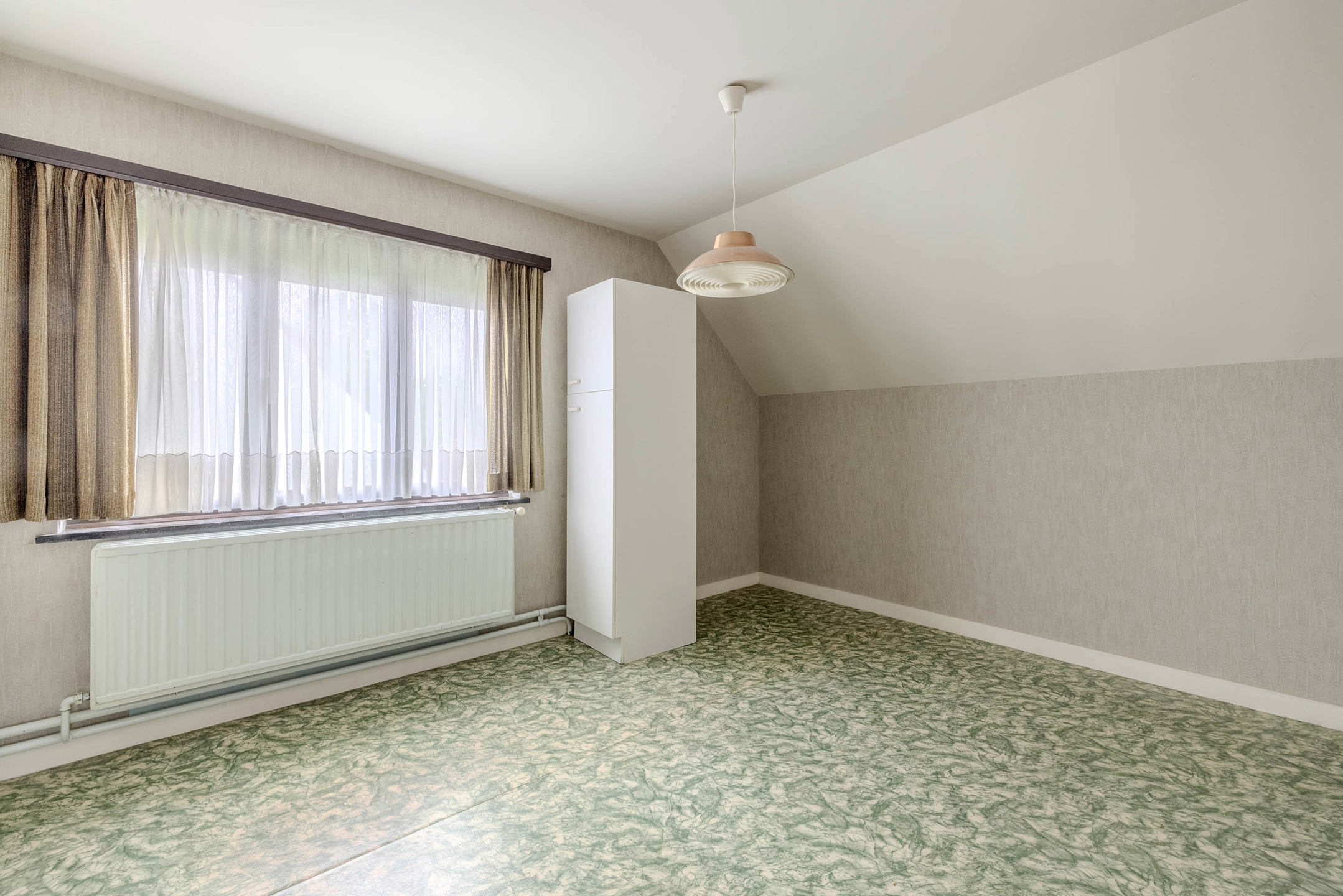 Te renoveren woning in Vosselaar op perceel van 1.554 m²!
