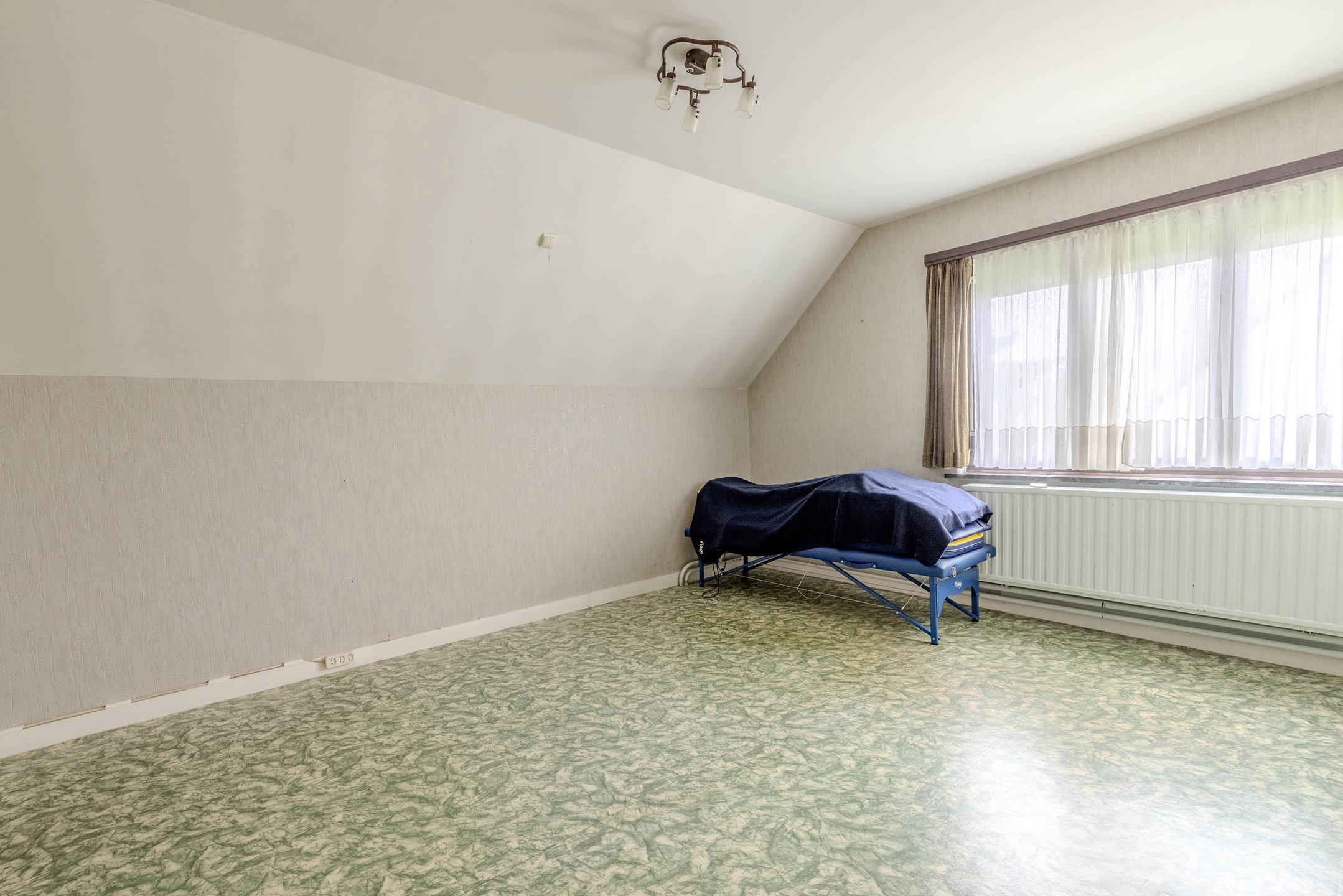 Te renoveren woning in Vosselaar op perceel van 1.554 m²!