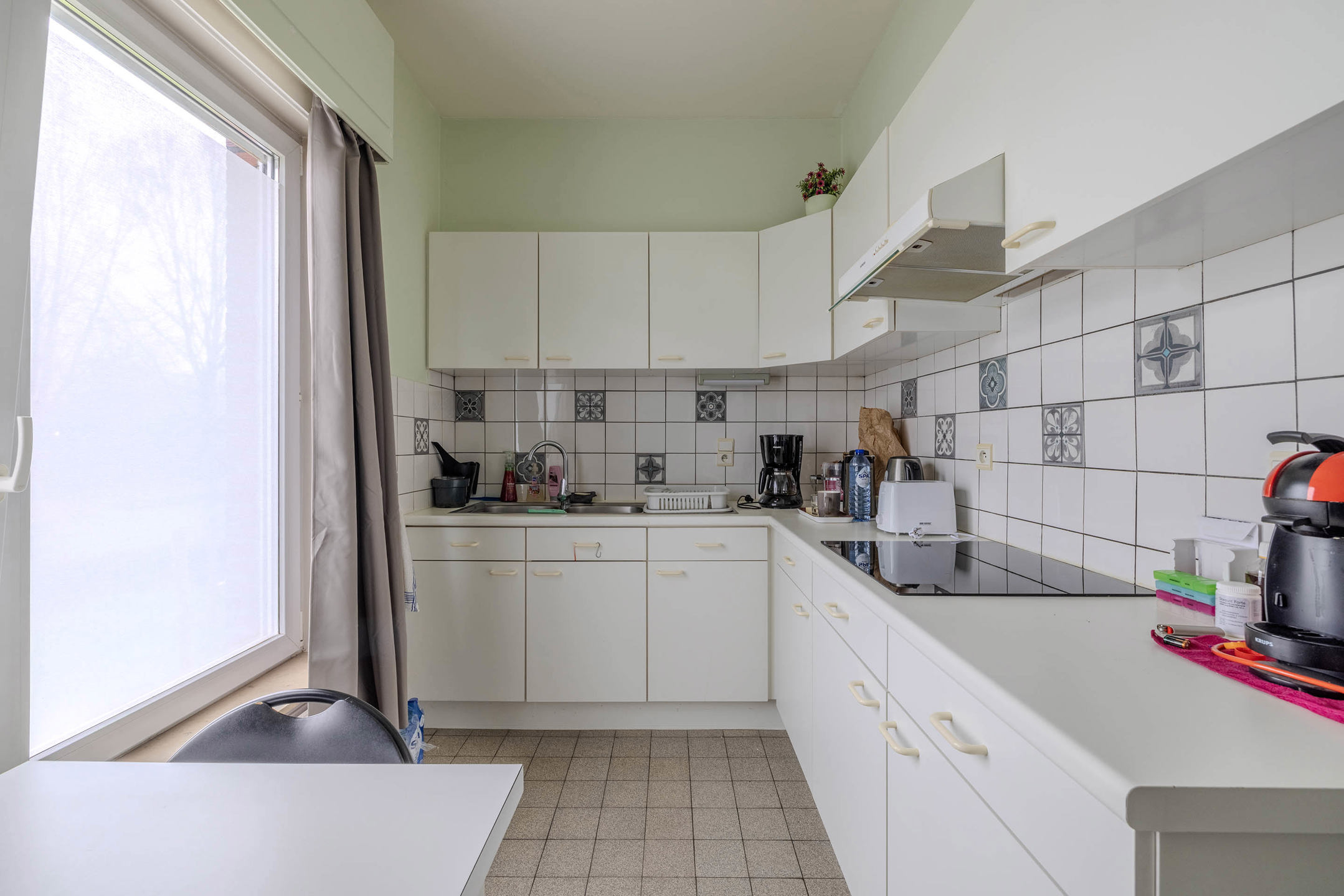 Gelijkvloers appartement met 1 slaapkamer en tuin!