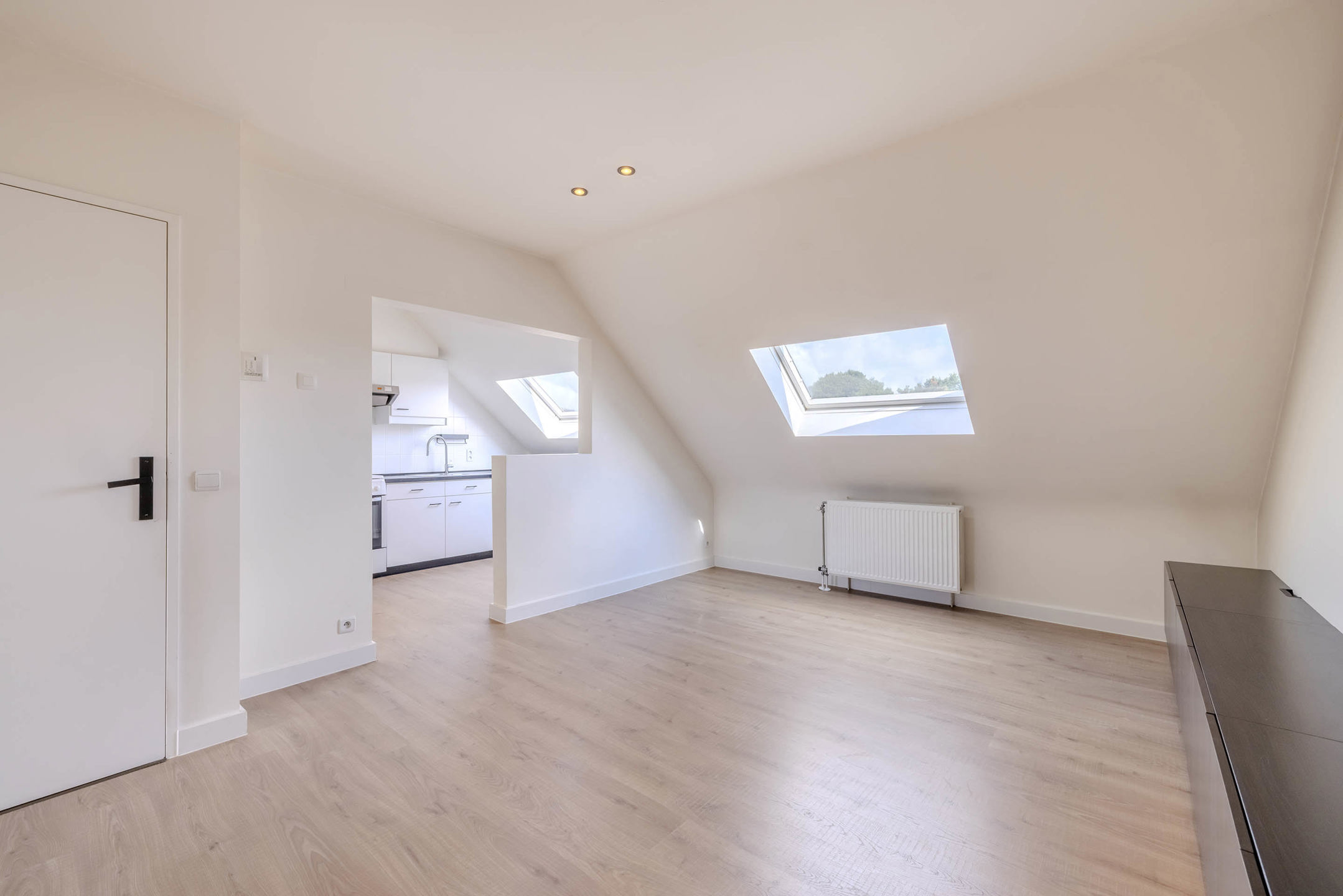 Dakappartement met 1 slaapkamer, ruim terras en staanplaats!