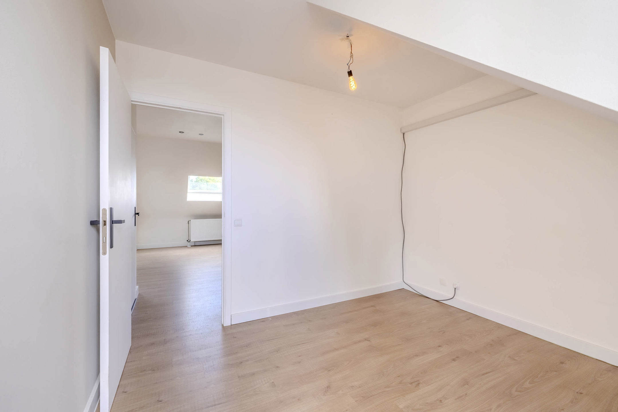 Dakappartement met 1 slaapkamer, ruim terras en staanplaats!