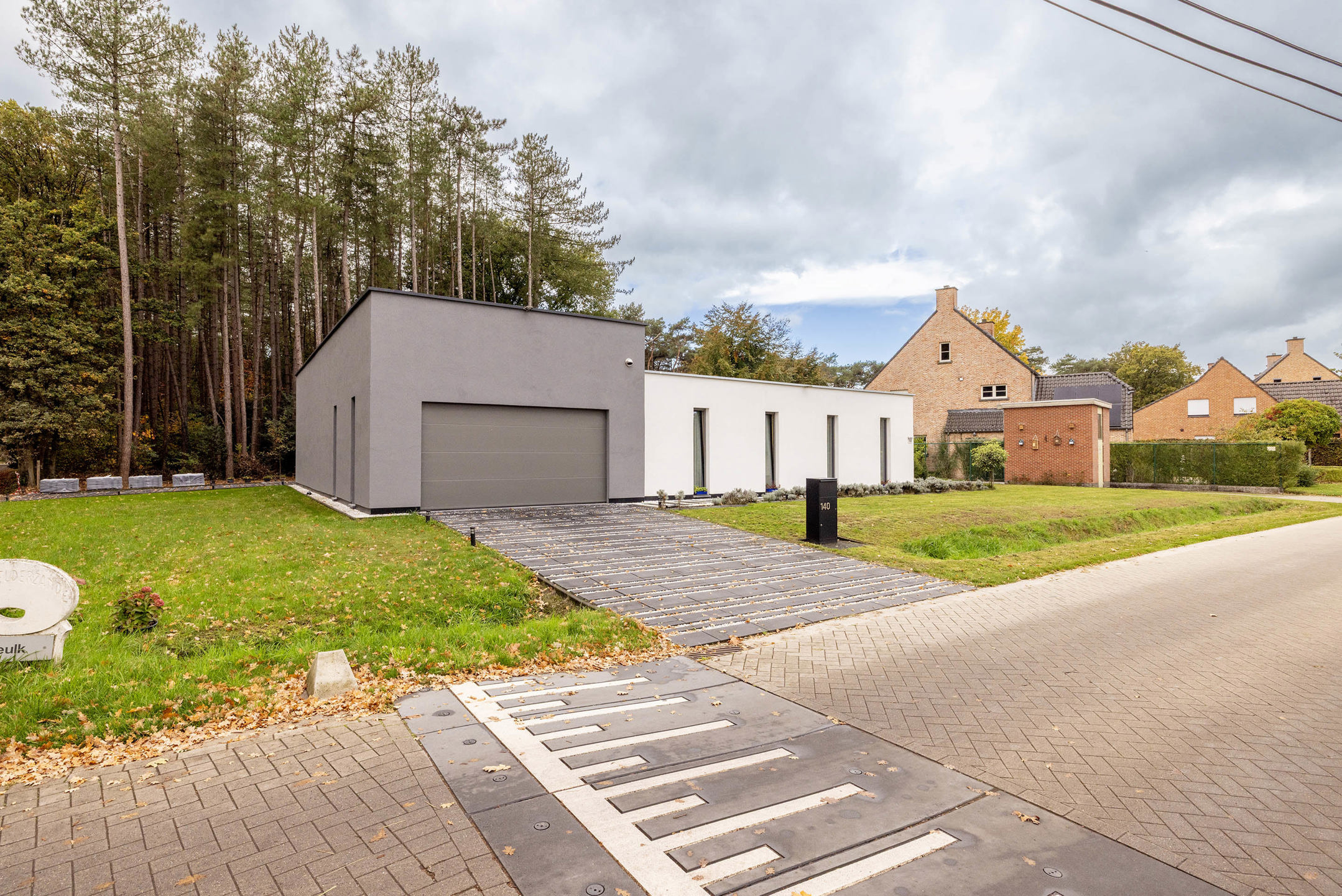 Gelijkvloerse woning met gekoppelde loods van 102m²