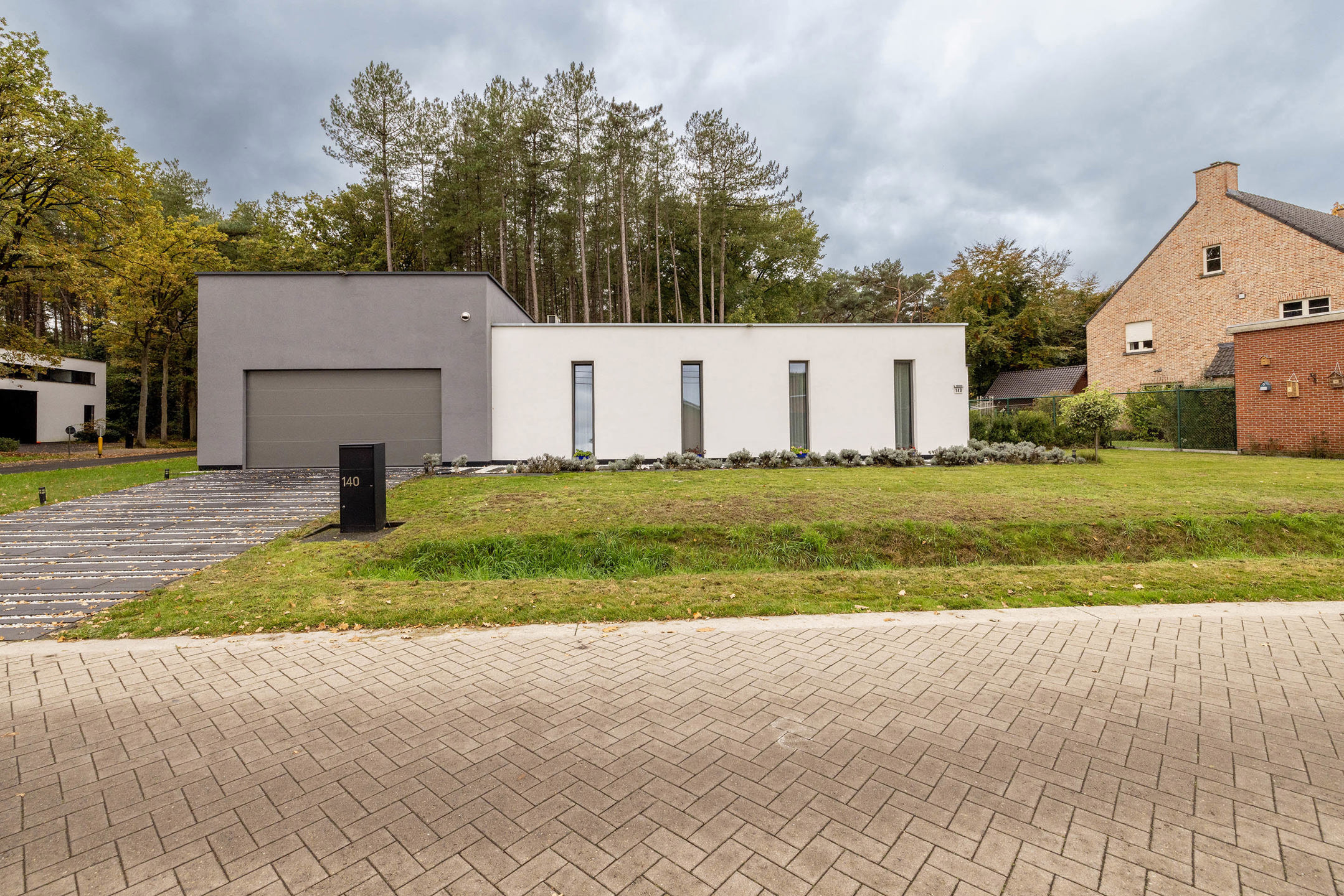 Gelijkvloerse woning met gekoppelde loods van 102m²