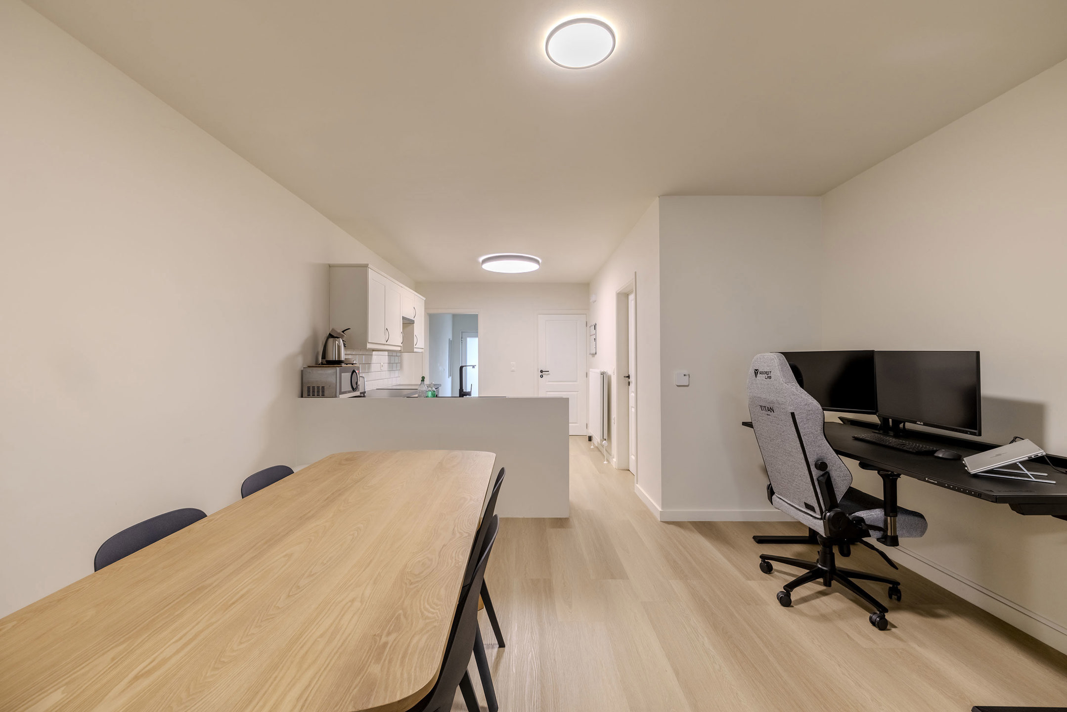 Gelijkvloers appartement met parking & tuin