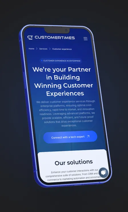 Mobile phone screen displaying CustomerTimes website homepage with headline about building winning customer experiences and a button to connect with a tech expert.