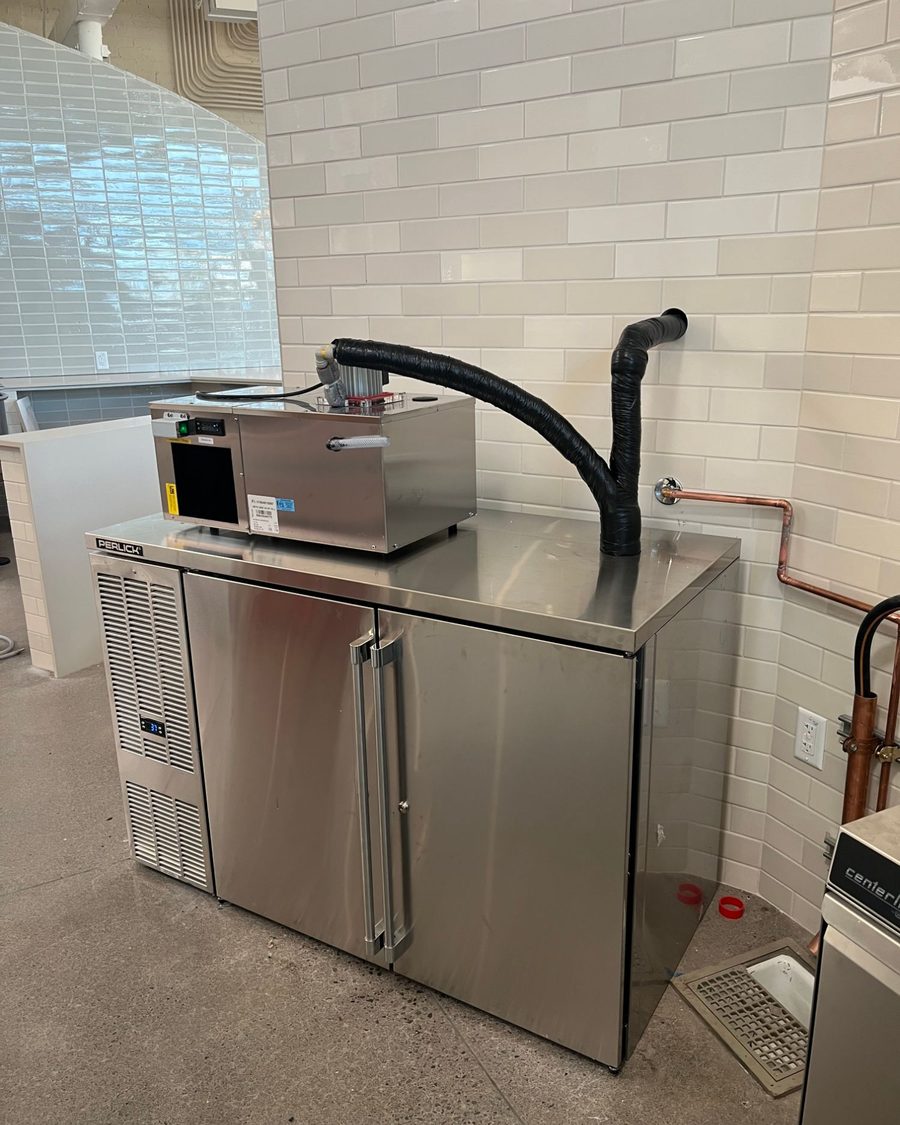 Glycol power pack chilling draft beer lines on a commercial bar install in Central Oregon