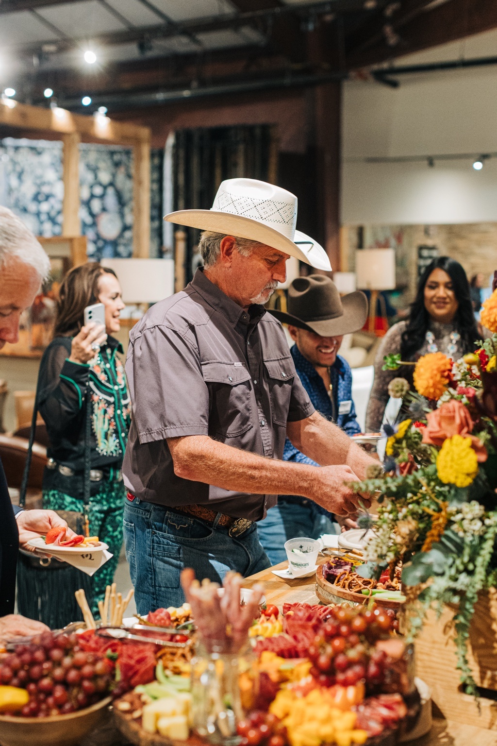 Guests enjoying Magdalena’s catering at an event