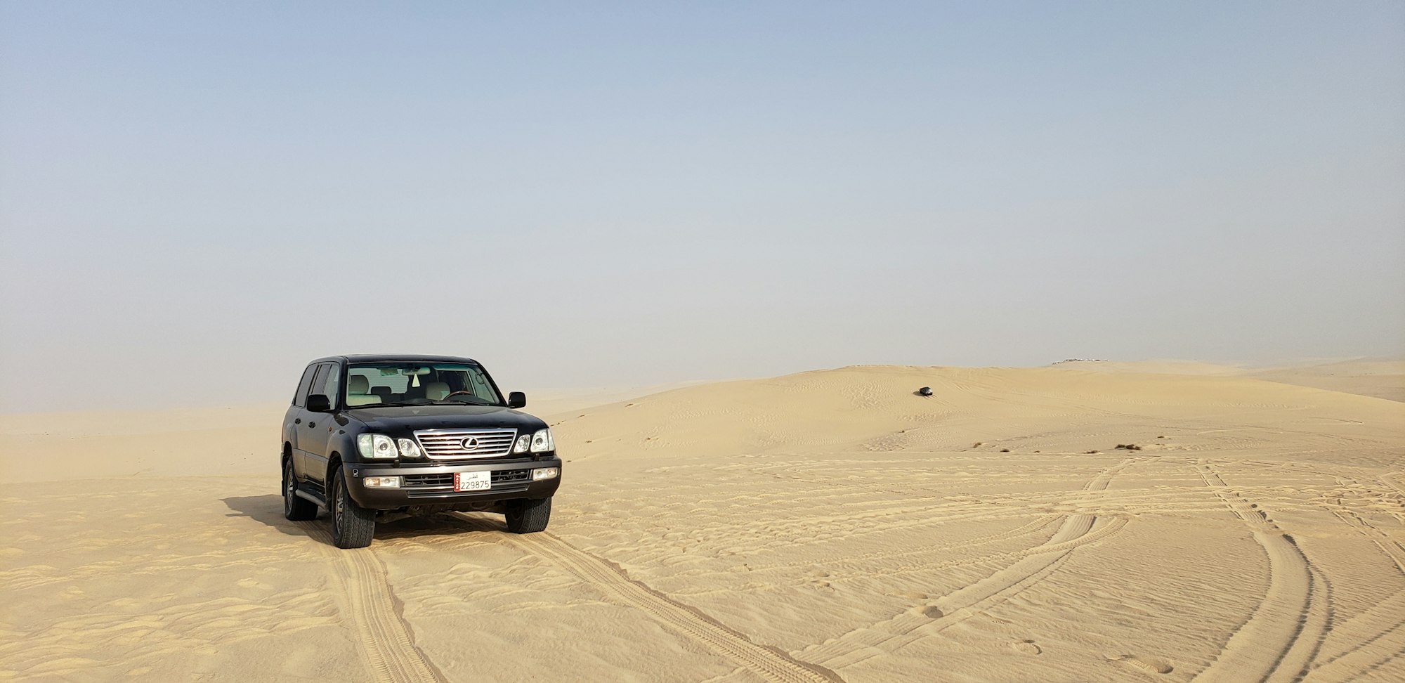 4x4 vehicle dune bashing in the desert