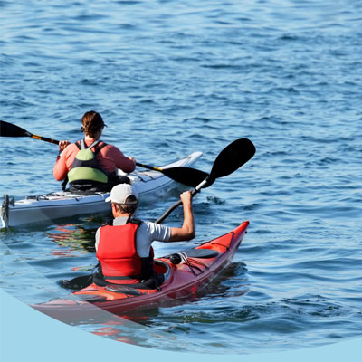 A pair of canoers on the water