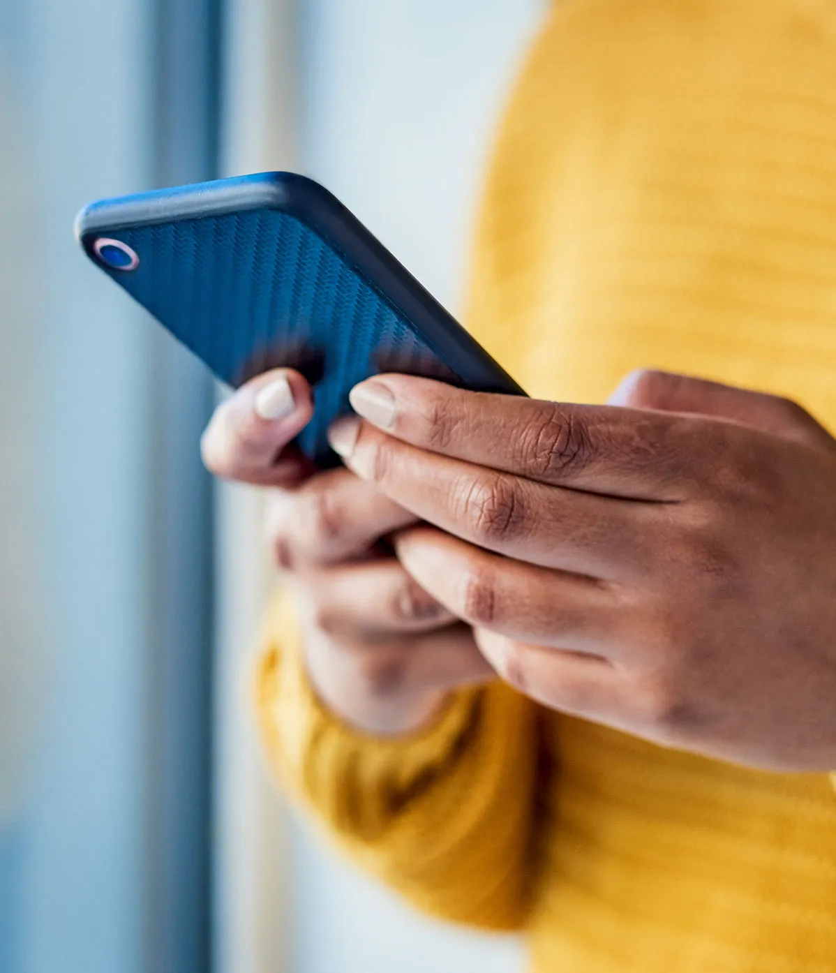 A user using a mobile device