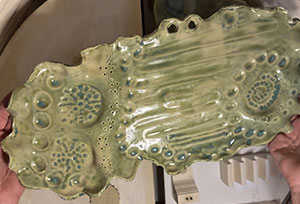 a handmade clay charcuterie tray