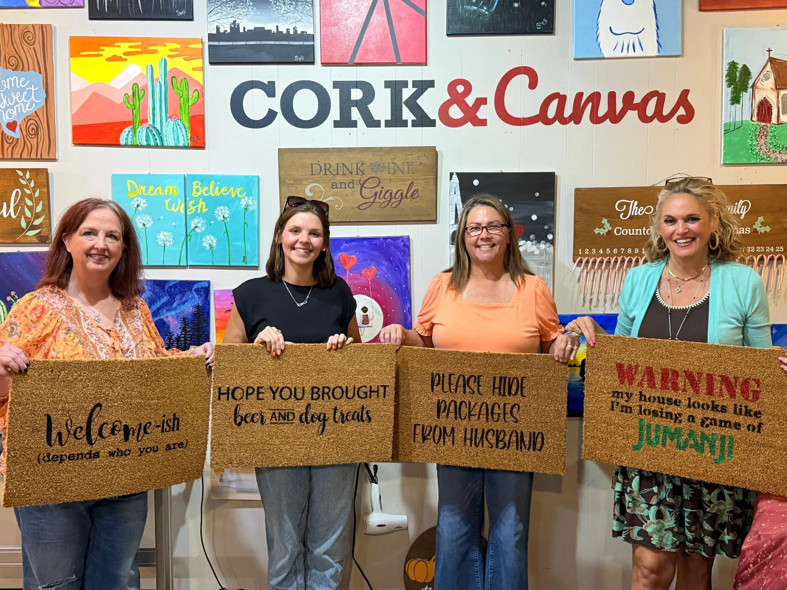 Guests celebrating together at a private Cork & Canvas event
