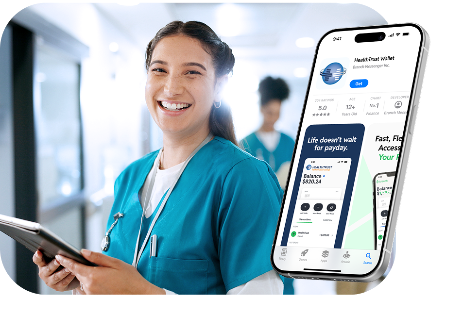 Smiling healthcare worker in scrubs holding a tablet with a phone showing HealthTrust Wallet app.