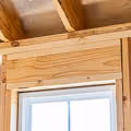 a 2x6 header above the window on a cabin shell