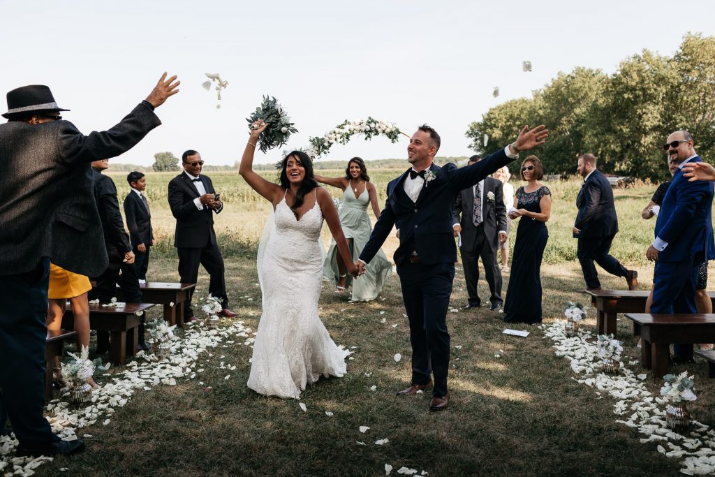 bride and groom dance out of pec backyard wedding ceremony