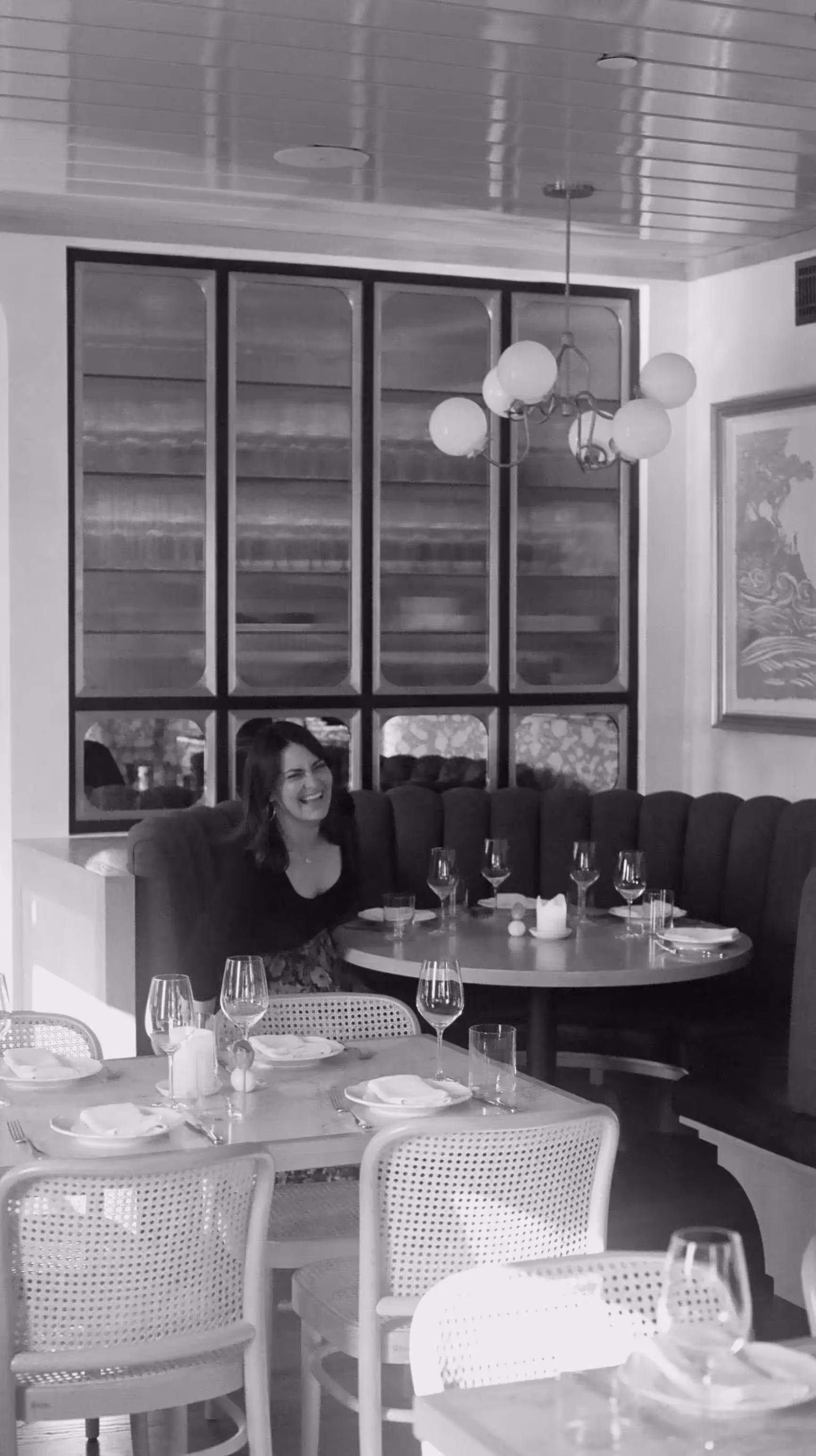 Monique Black, co-owner of Chez Noir, in a booth at the Carmel restaurant.