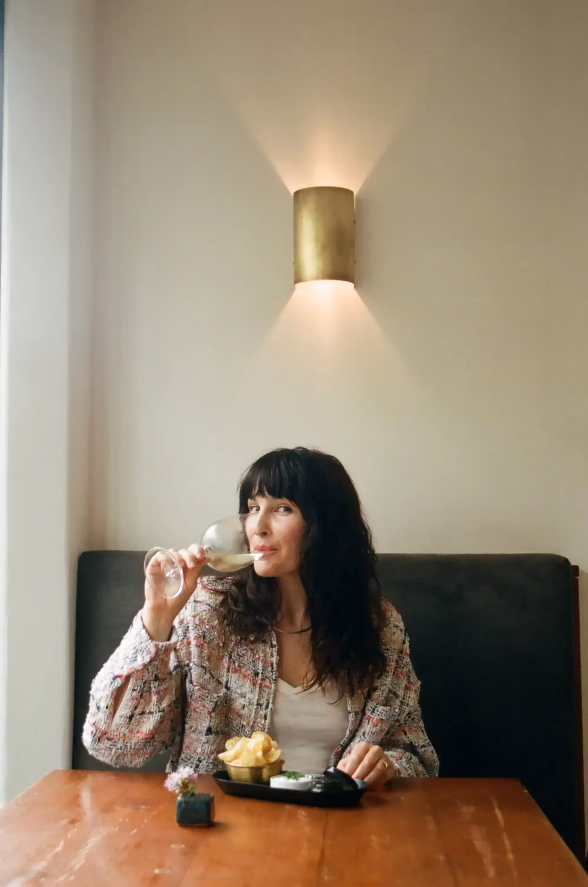 Portrait of Alissa Carnazzo drinking wine