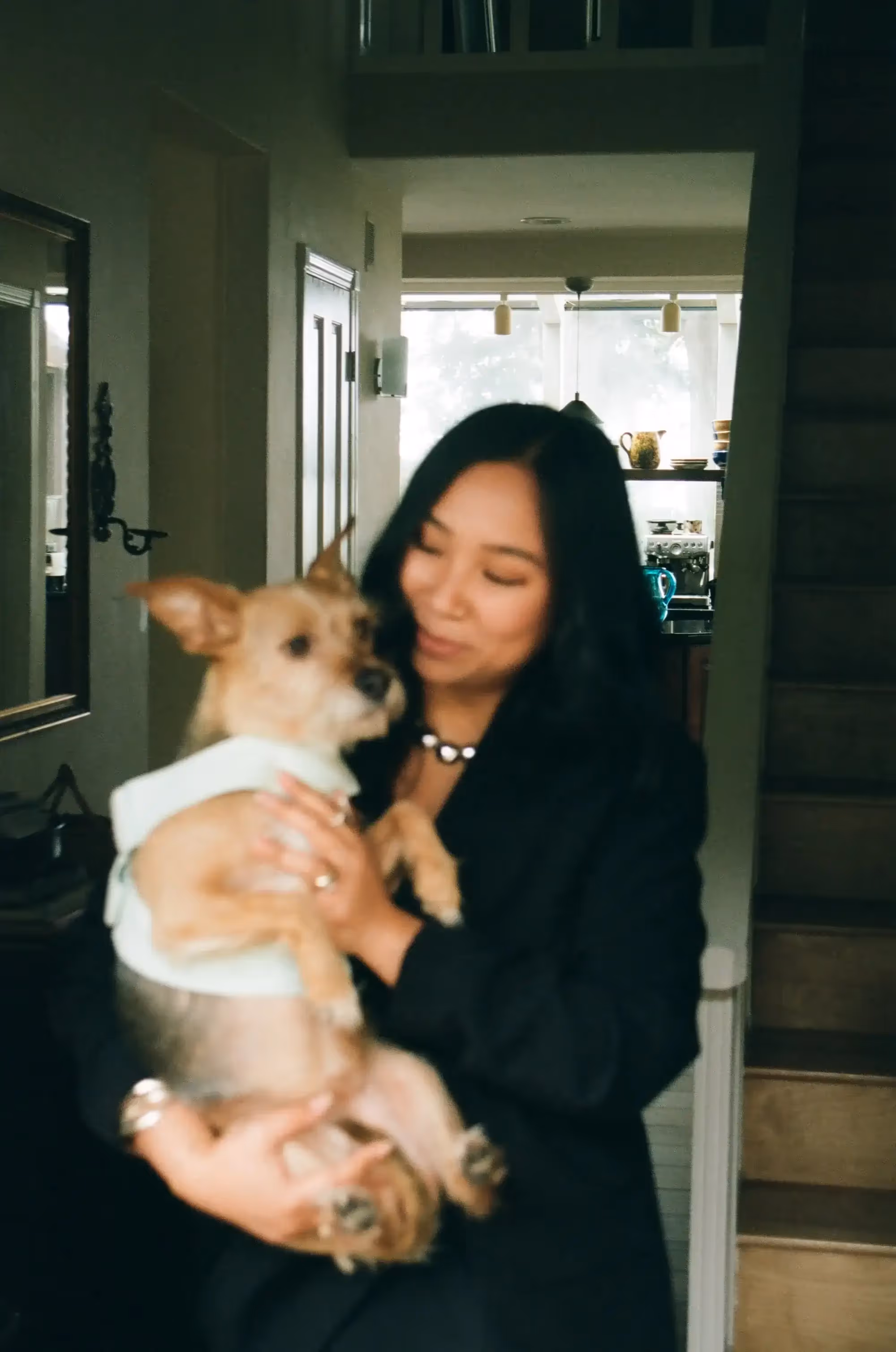 Leah Cabardo holding her dog