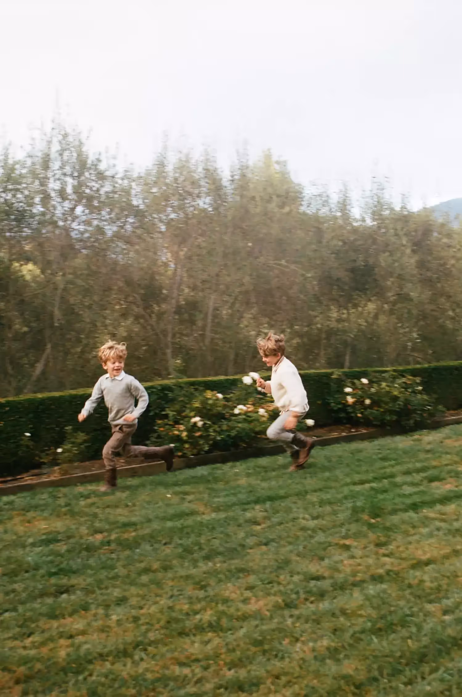 Sarah Hawthorne's two sons playing in the grass