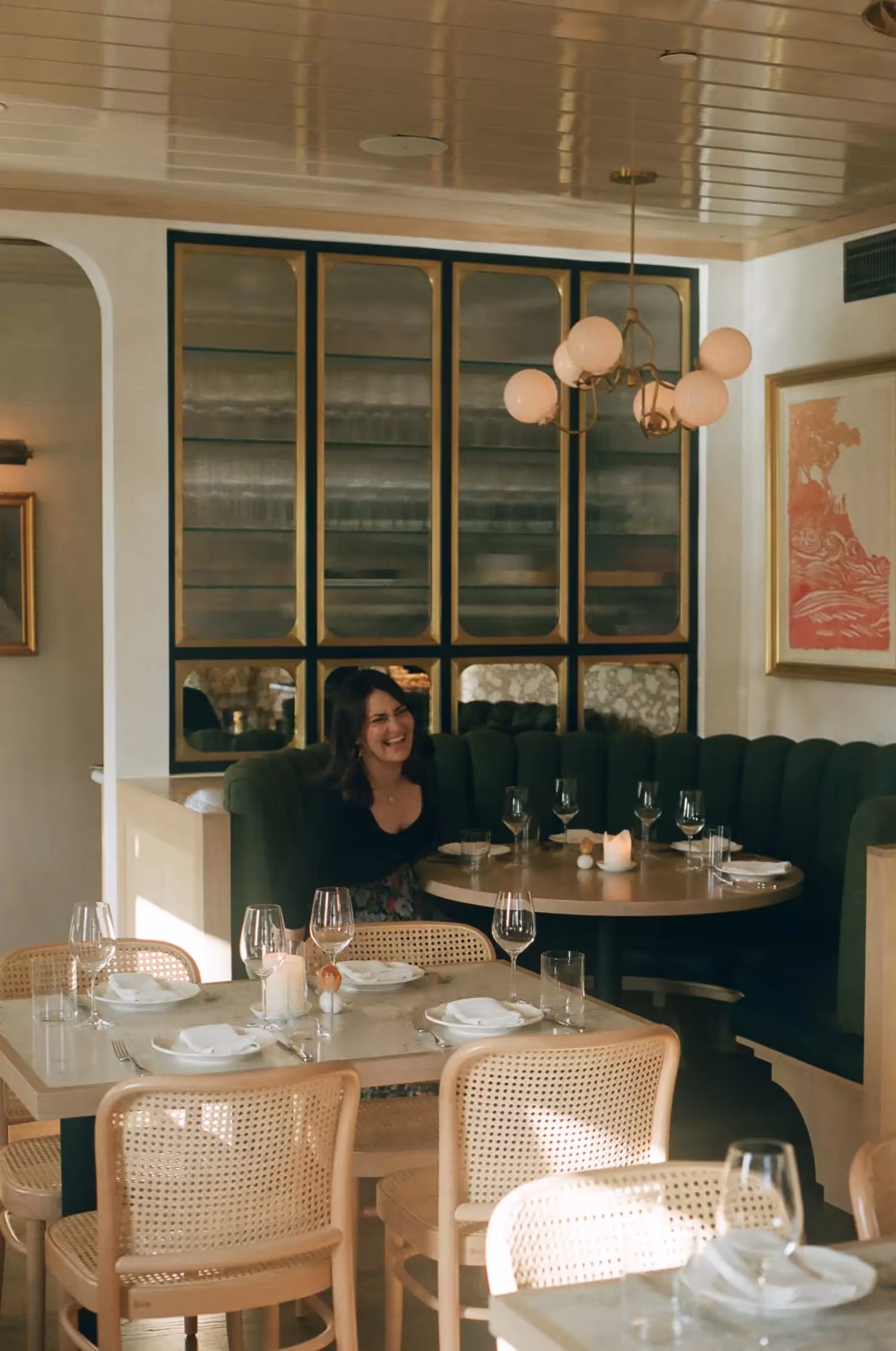 Inside of Chez Noir dining room with co-owner Monique Black