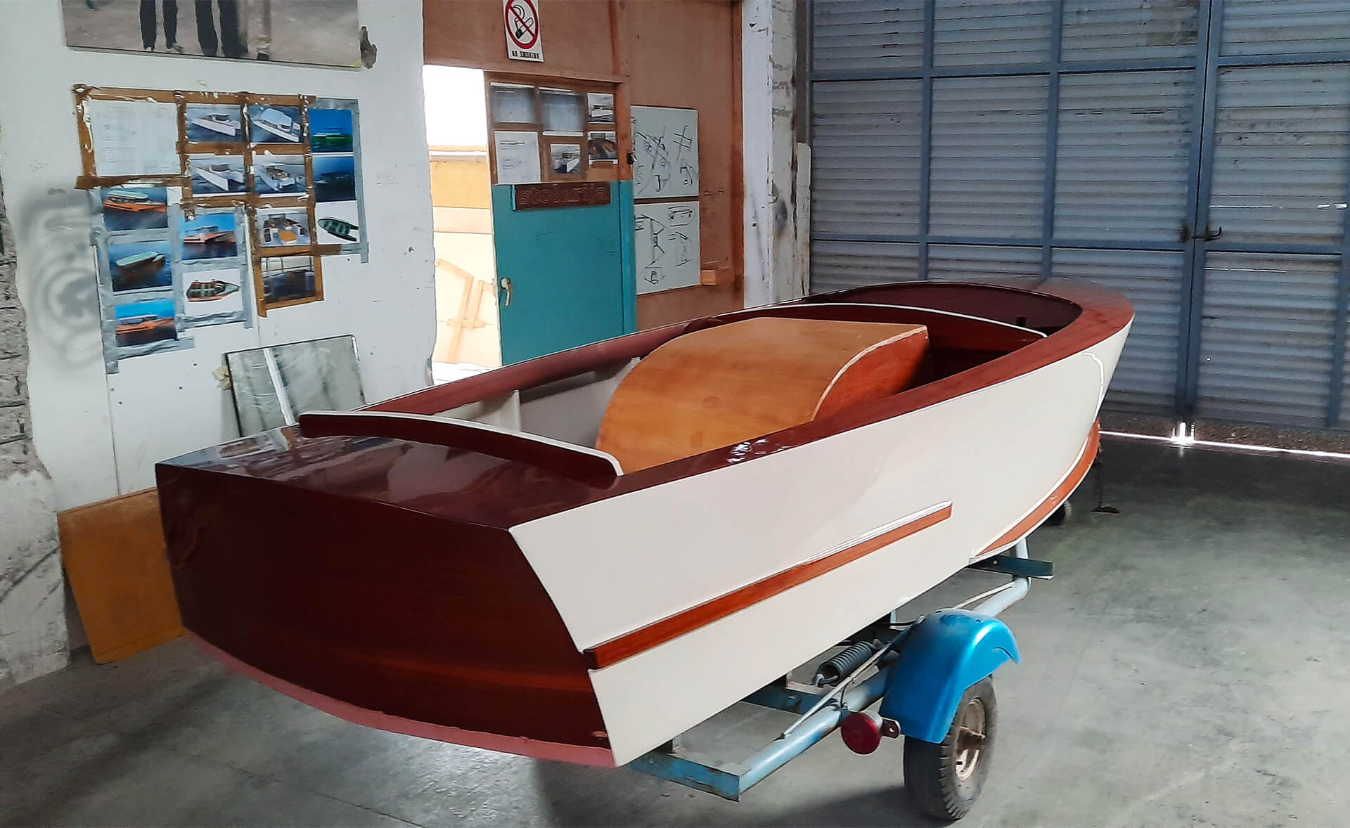 Fracrat speedboat in painting booth.