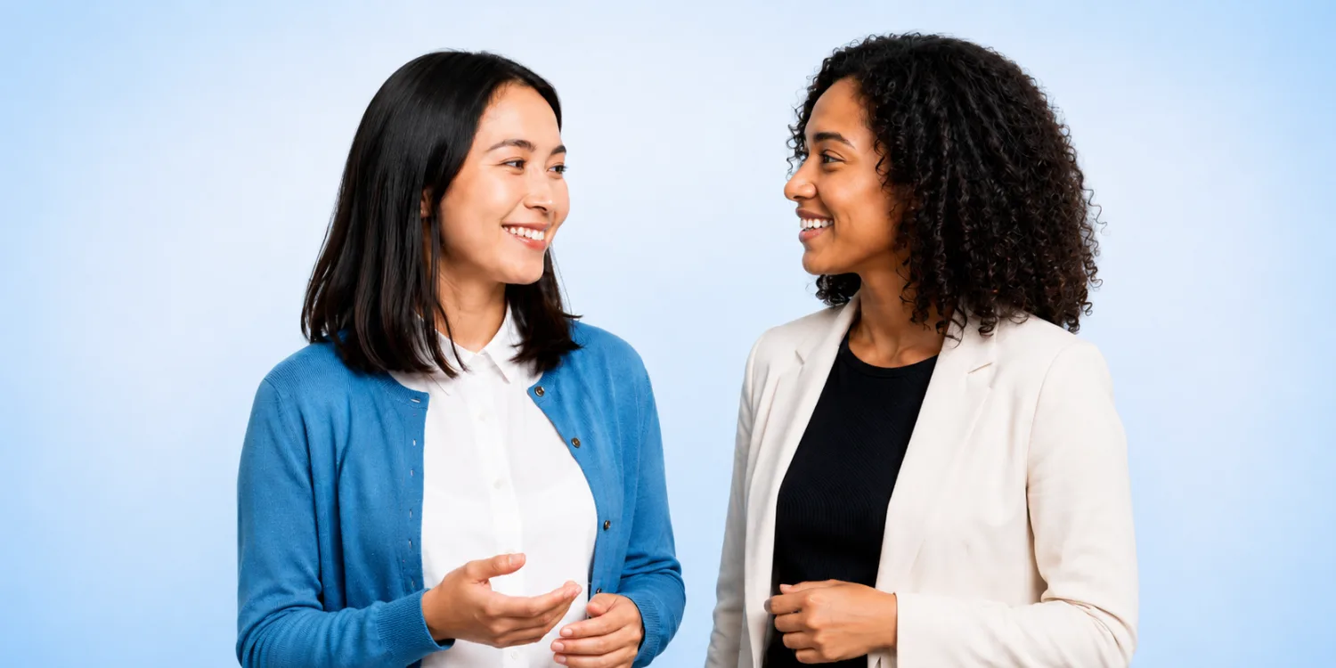 Two professionals talking against a soft blue background for Awin vs Impact affiliate network comparison article.