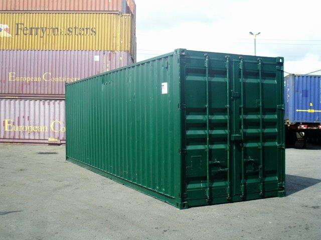 Used 30ft shipping container with a single container door for sale, compact steel secure storage unit with double locking doors, wind and watertight. The unit is a modified container painted in a bottle green colour.