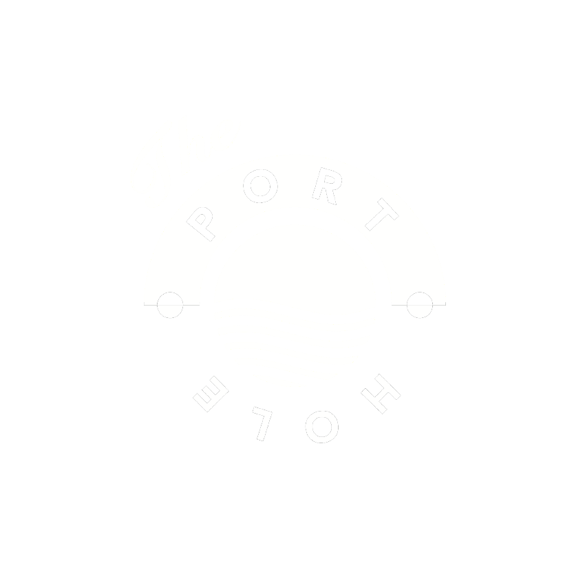 The logo of a karaoke bar called Kaleidoscope. The logo is geometric, flat & white. The geometric shape resembles the letter 'K'.