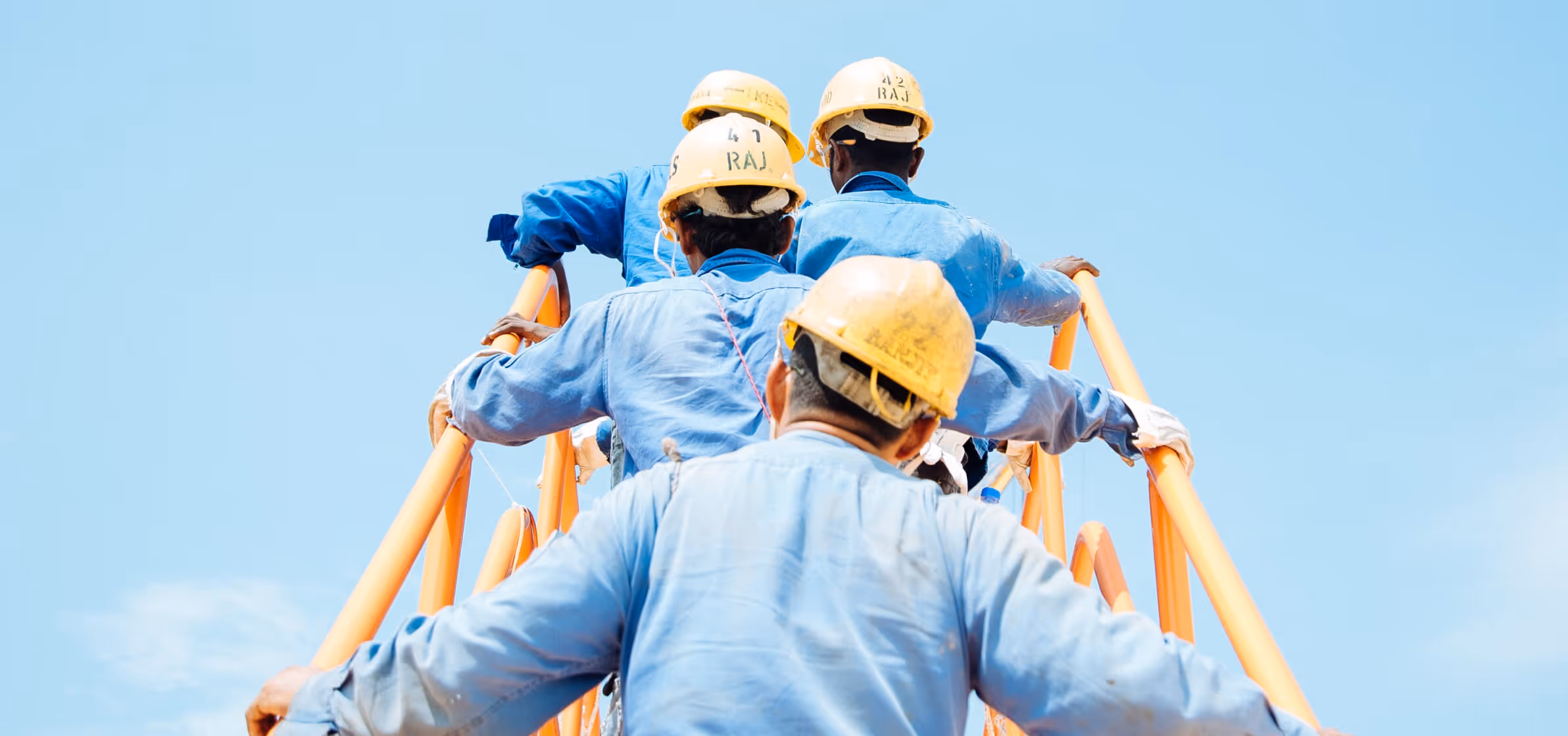 Three people in construction services are heading towards the digital transformation