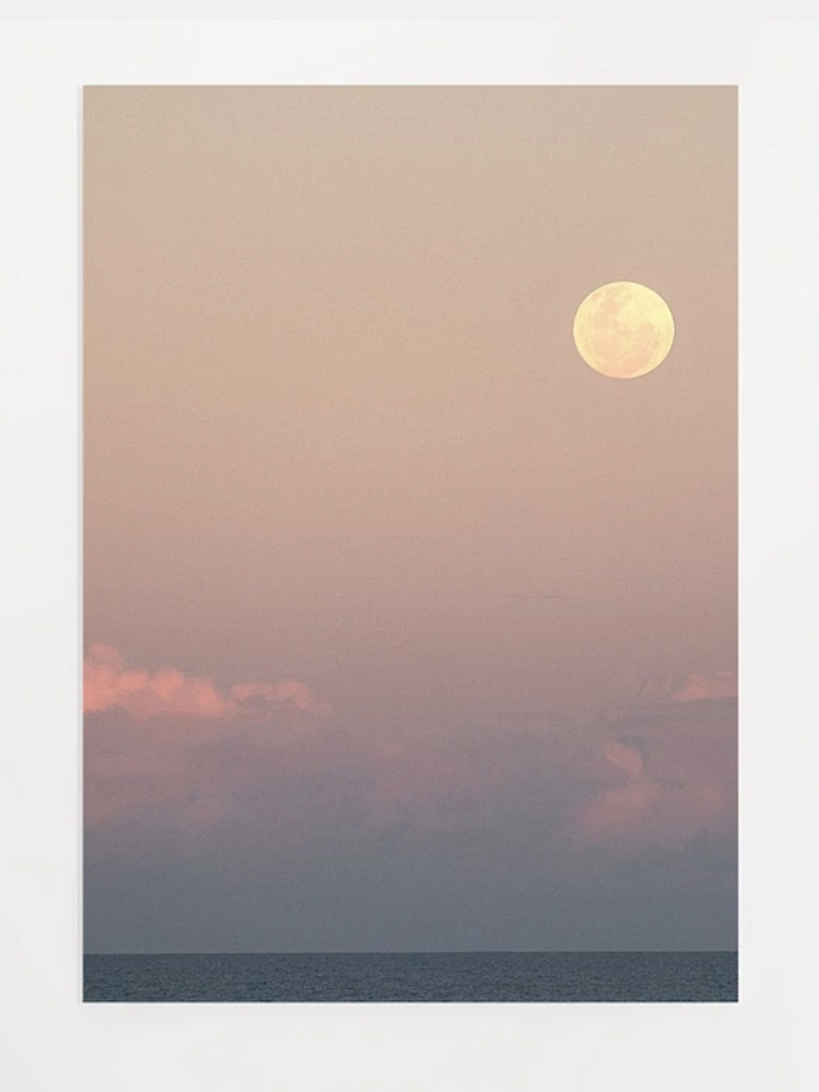 moonrise over ocean printed on paper