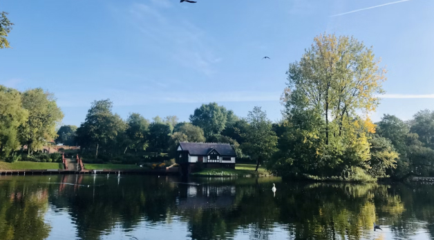 A Stoke-on-Trent park lake on a bright autumn morning