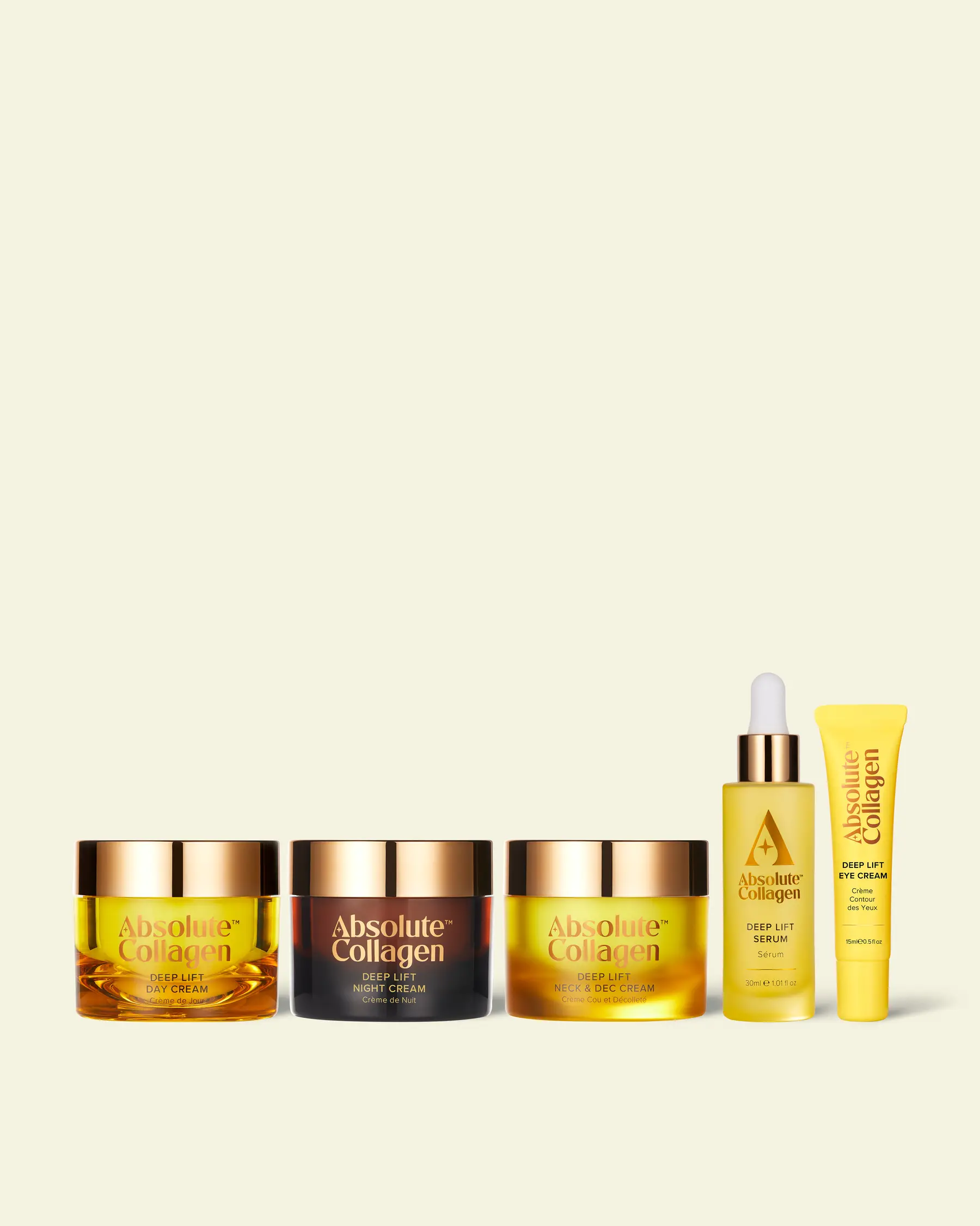 Cinco productos para el cuidado de la piel de Absolute Collagen: crema de día, crema de noche, crema para cuello y escote, sérum con gotero y crema para ojos en envases amarillos y marrones con una tapa dorada sobre un fondo claro.