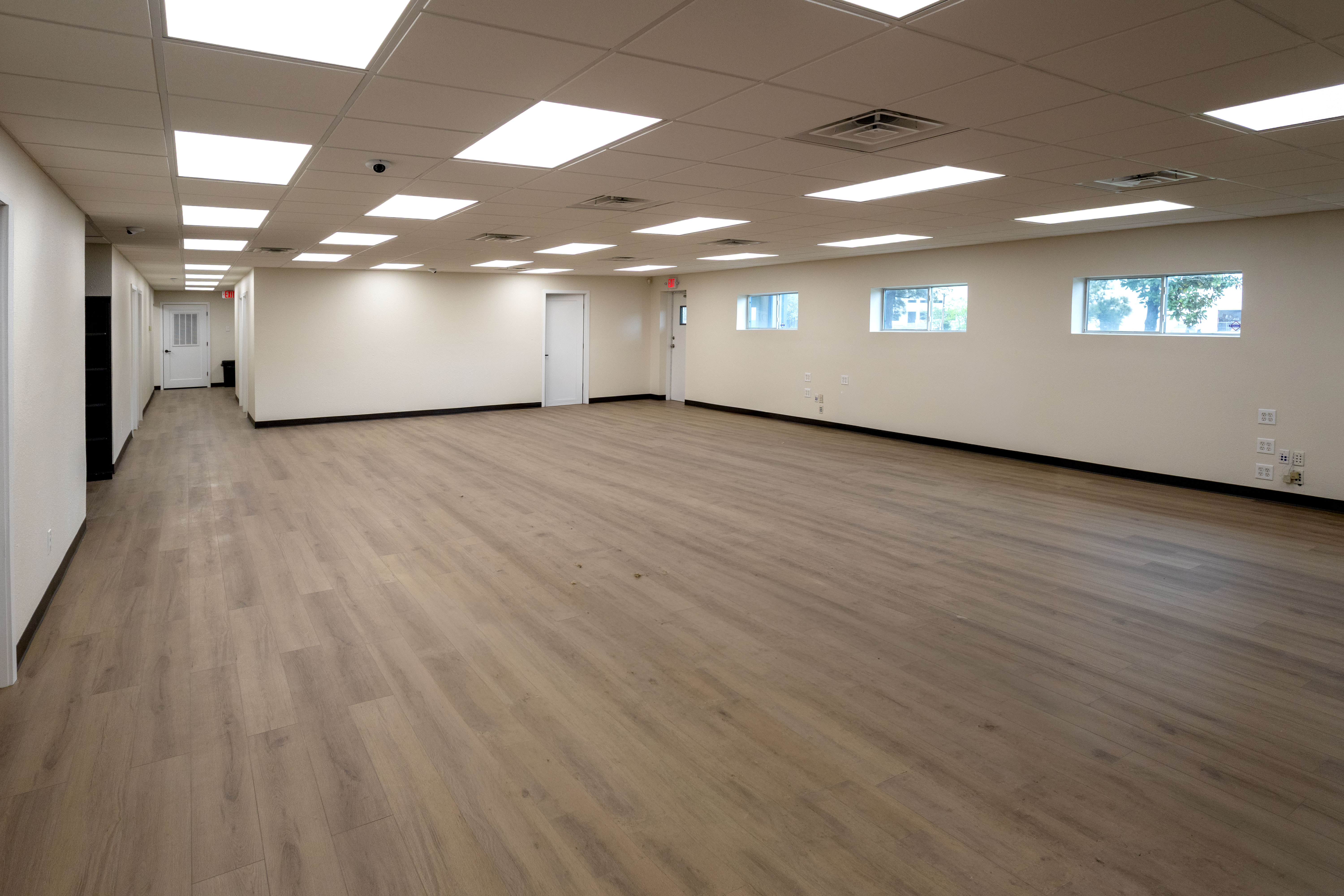 Completed Detail Design office renovation by NTN Construction in Houston