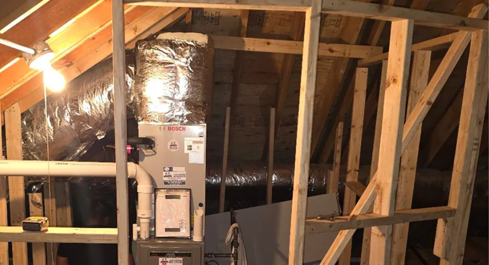HVAC ductwork and equipment installed in an attic for home ventilation and airflow.