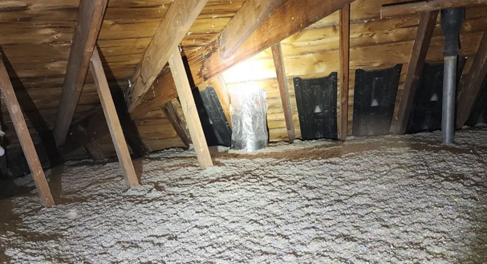 Attic insulation installed across the attic floor to help regulate indoor temperatures year-round.