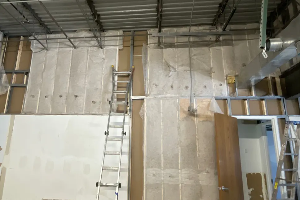 Faced batt insulation installed in steel framed walls with the vapor facing exposed